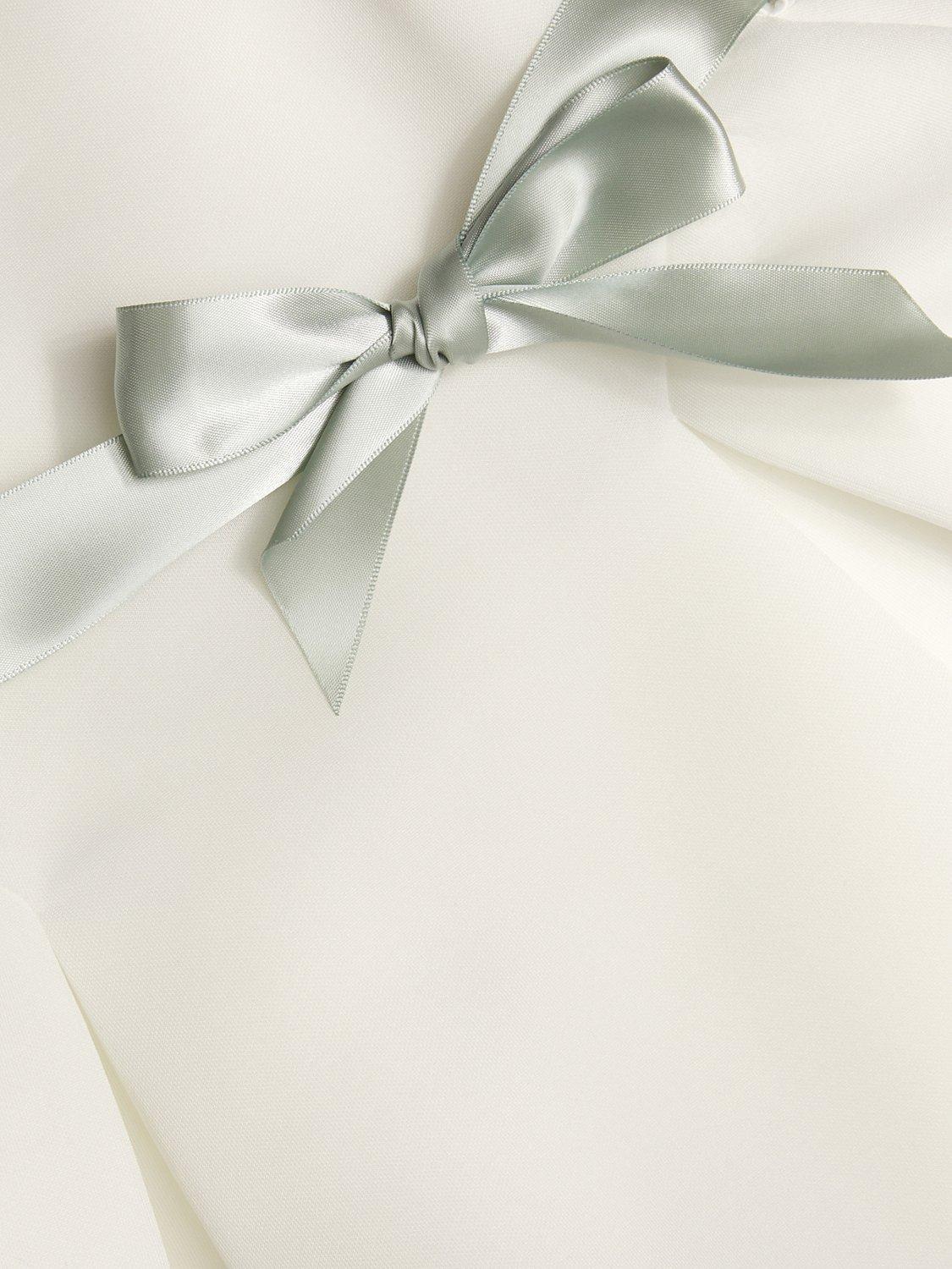 Product image 3 of 3, which shows Monsoon Baby Holly Bow Scuba Bridemaids Dress, Ivory, 0-3 months