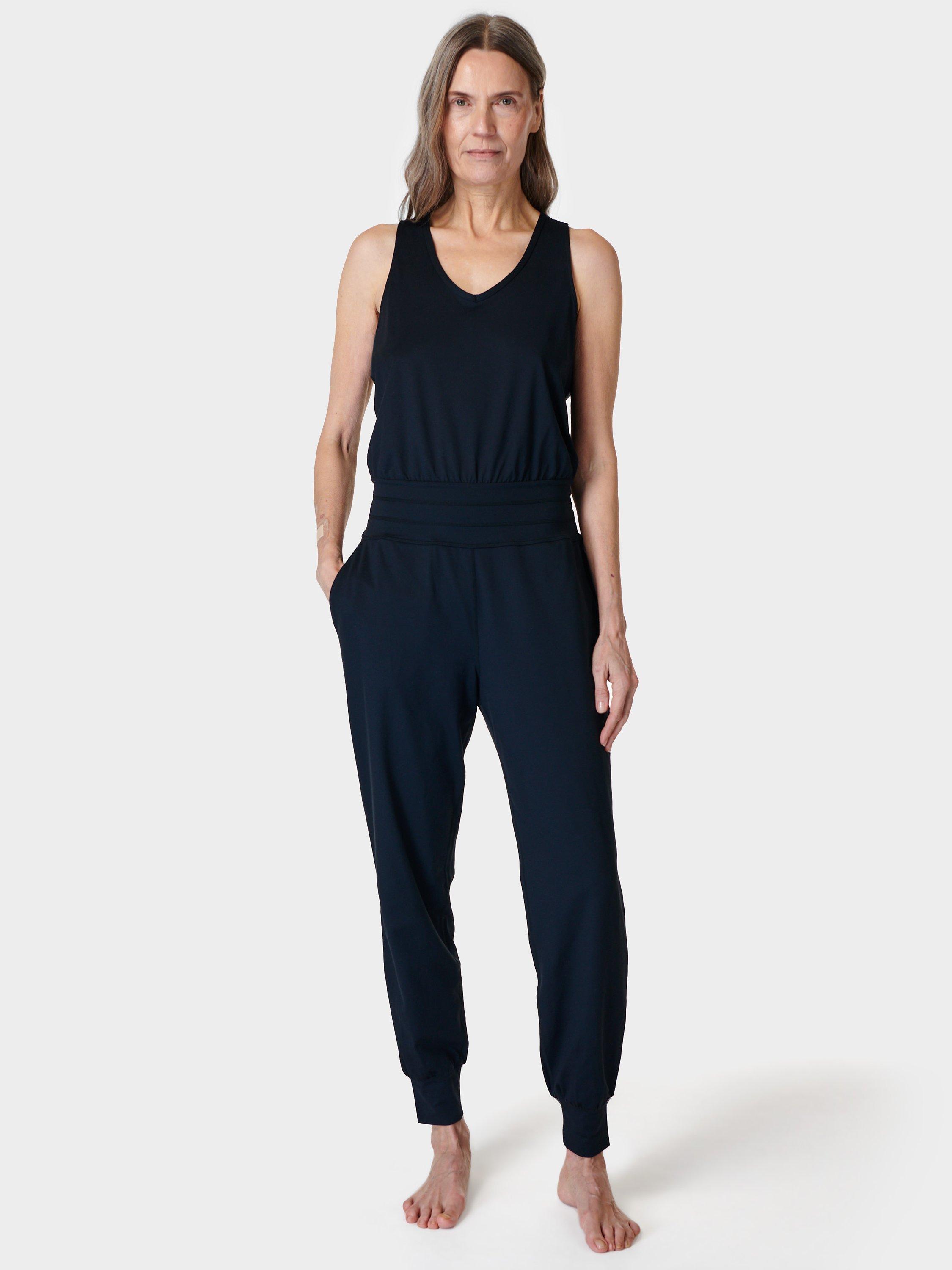 Product image 1 of 5, which shows Sweaty Betty Gaia Yoga Jumpsuit, Black, XS