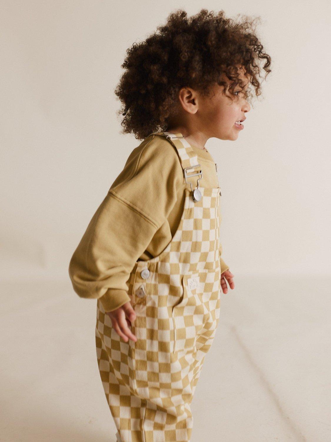 Product image 3 of 3, which shows Claude & Co Baby Organic Cotton Medium Checkerboard Print Dungarees, Ochre, 4-5 years