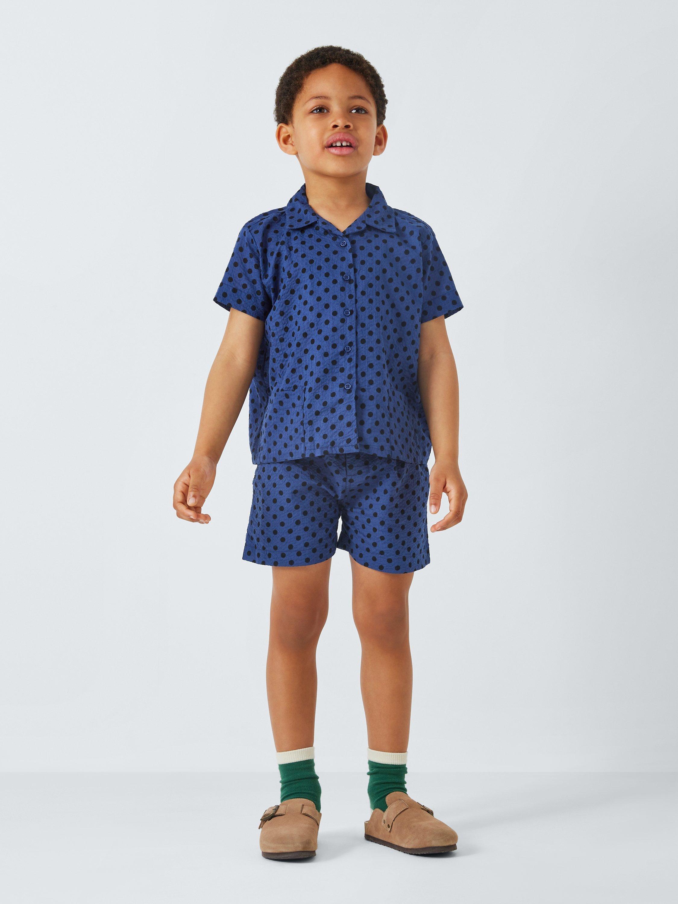 Product image 2 of 7, which shows Caramel Kids' Apium Polka Dot Shorts, Navy, 3 years