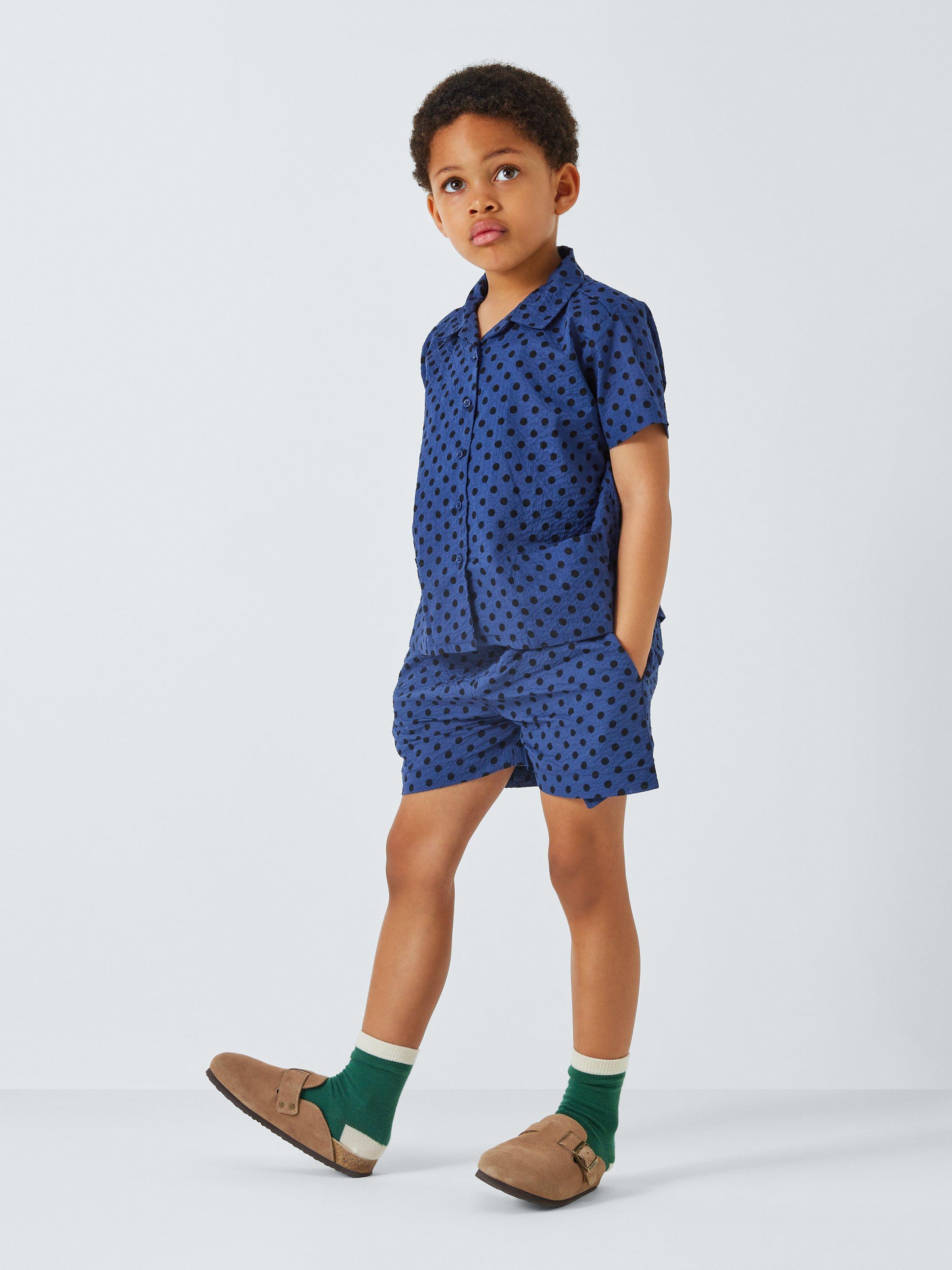 Product image 2 of 7, which shows Caramel Kids' Bamboo Polka Dot Shirt, Navy, 3 years