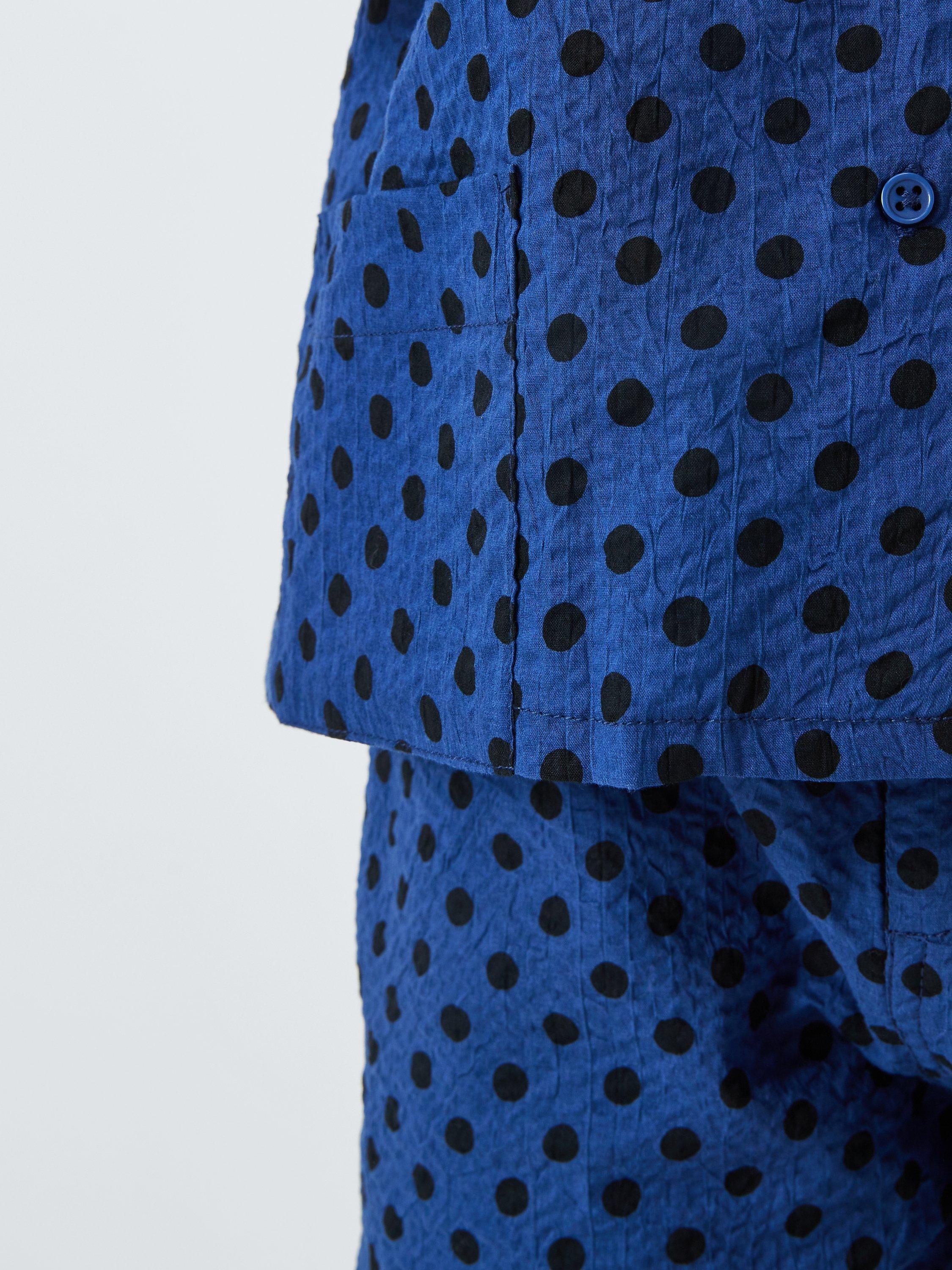 Product image 5 of 7, which shows Caramel Kids' Bamboo Polka Dot Shirt, Navy, 3 years