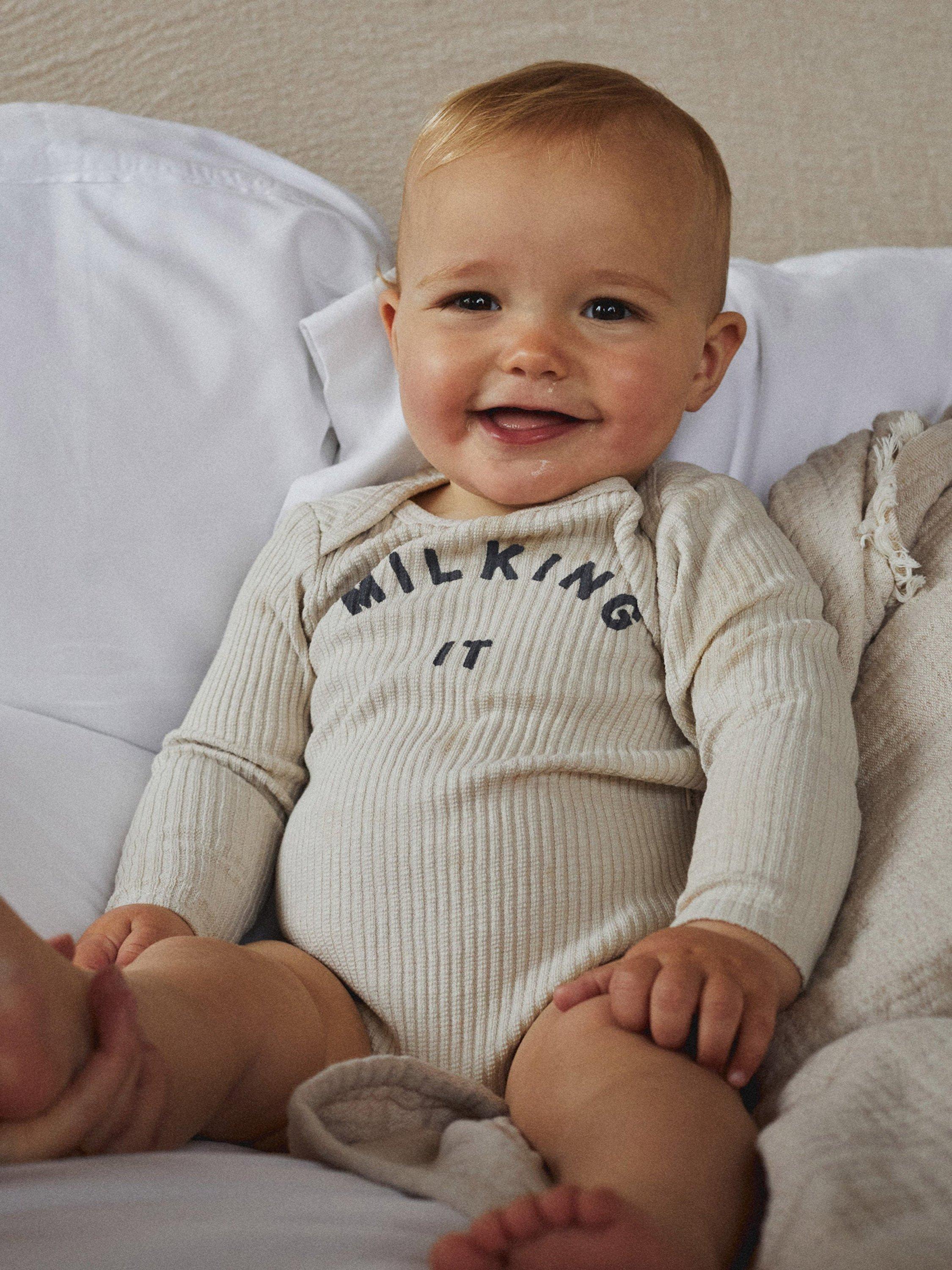 Product image 1 of 1, which shows Claude & Co Baby Organic Cotton Milking It Bodysuit, Oat, 0-3 months