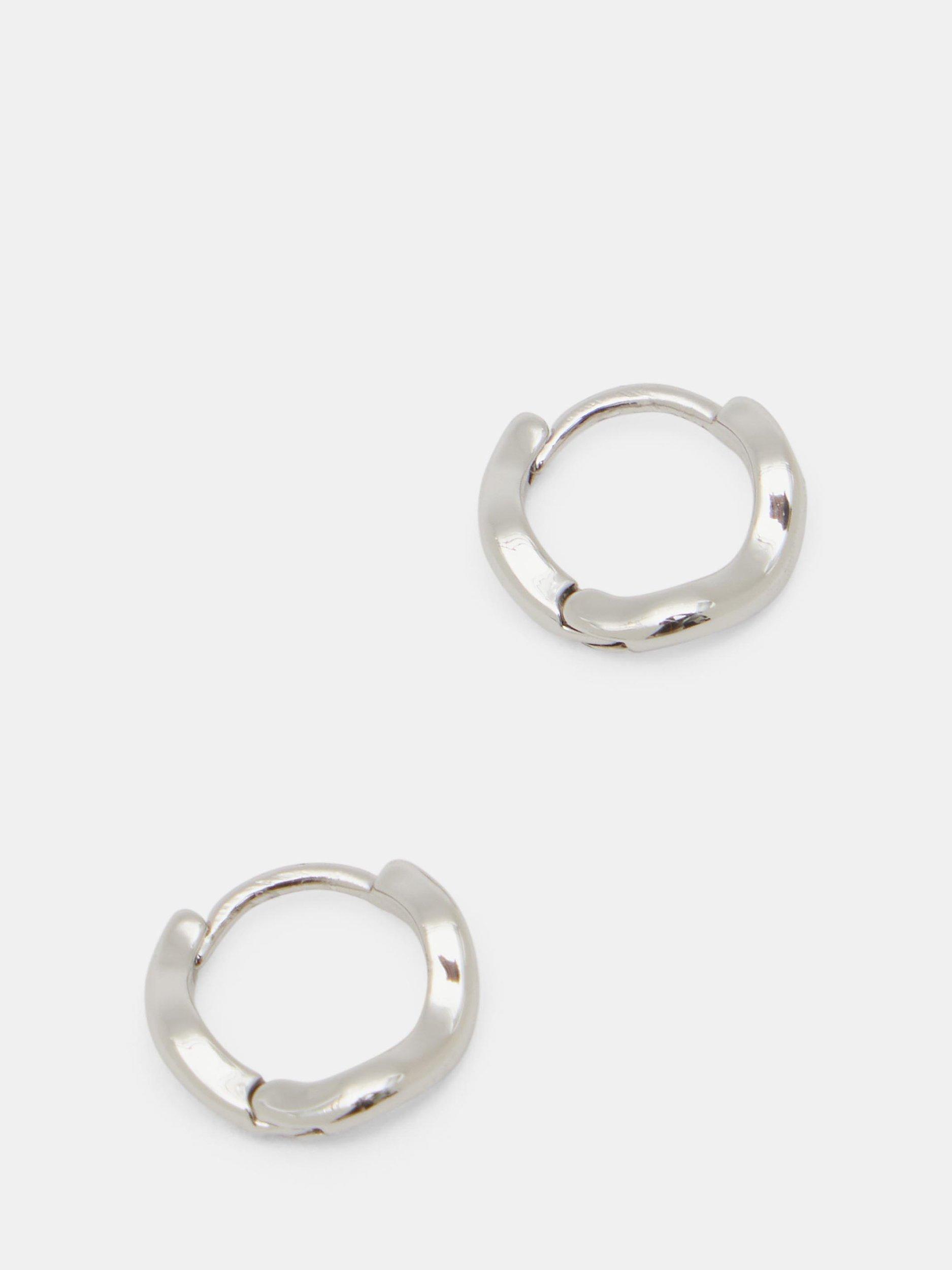 Product image 1 of 3, which shows HUSH Fern Twist Huggie Hoop Earrings, Silver, One Size