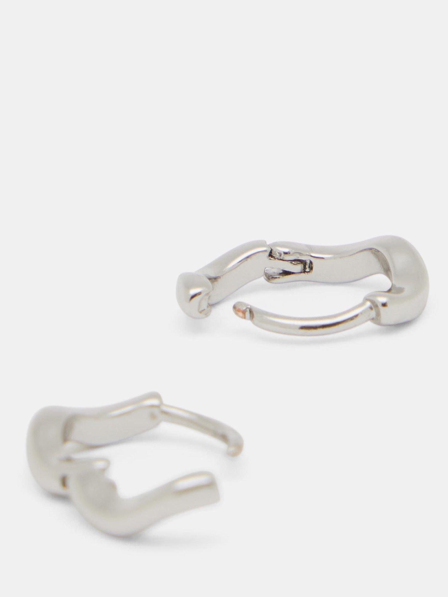 Product image 3 of 3, which shows HUSH Fern Twist Huggie Hoop Earrings, Silver, One Size