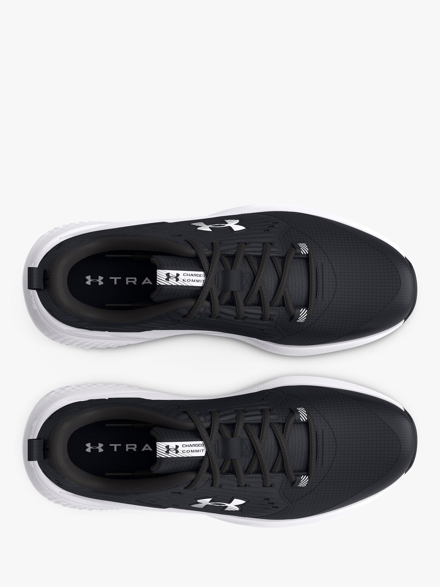 Product image 4 of 6, which shows Under Armour Charged Men's Running Shoes, Black/White, 9