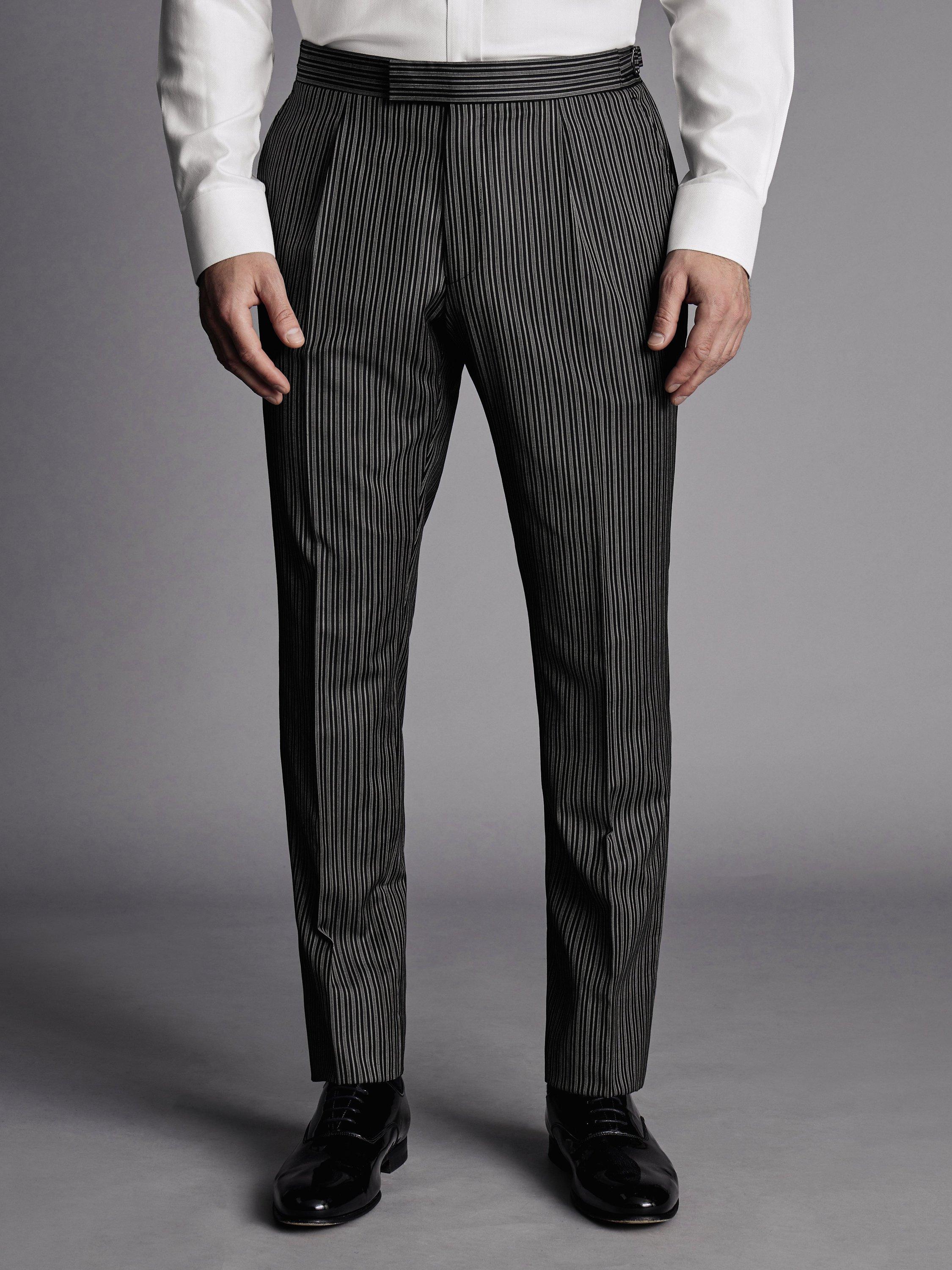 Product image 1 of 2, which shows Charles Tyrwhitt Morning Stripe Slim Fit Suit Trousers, Black, W30/L30
