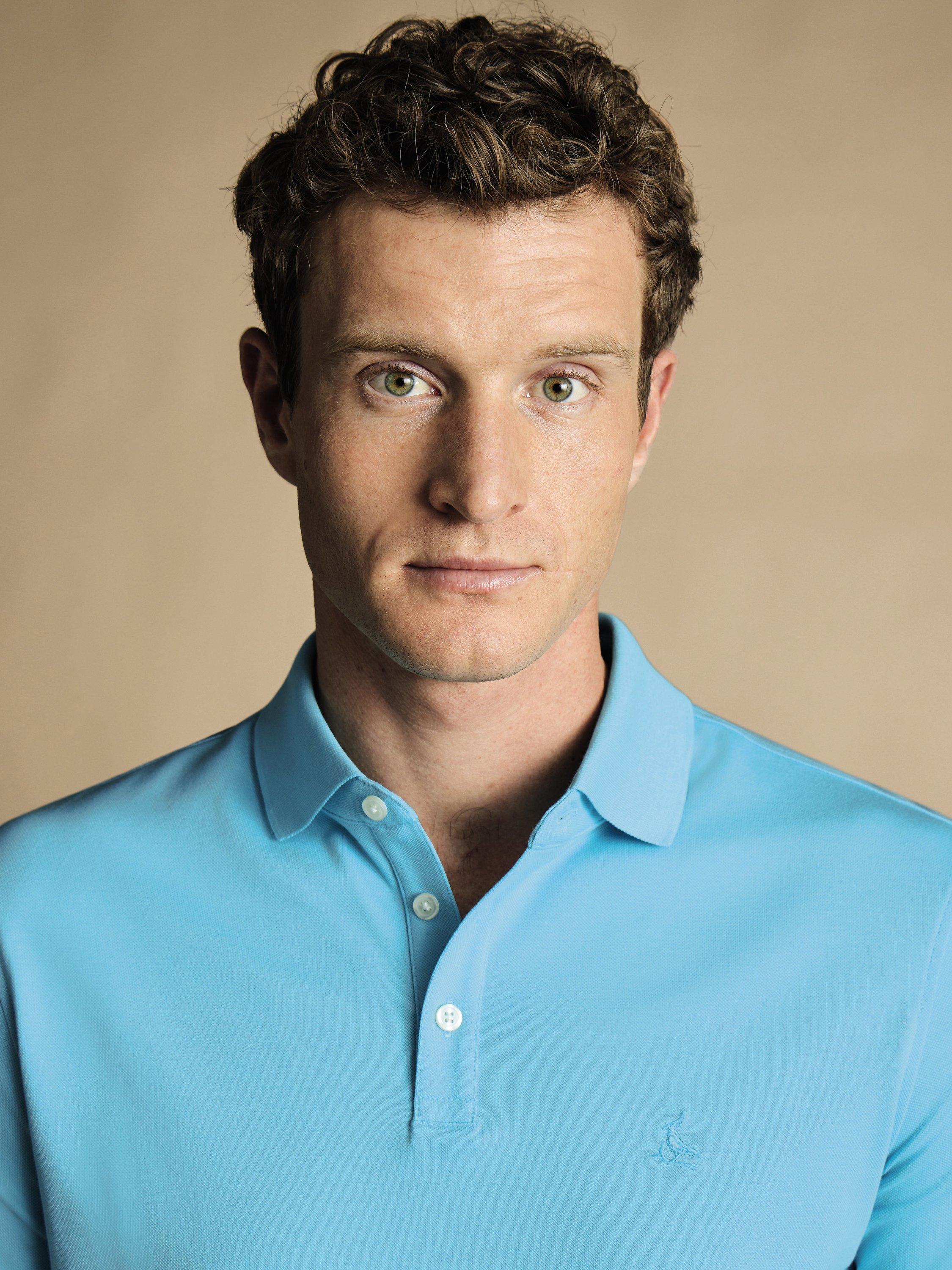 Product image 2 of 4, which shows Charles Tyrwhitt Pique Cotton Polo Shirt, Aqua, XS