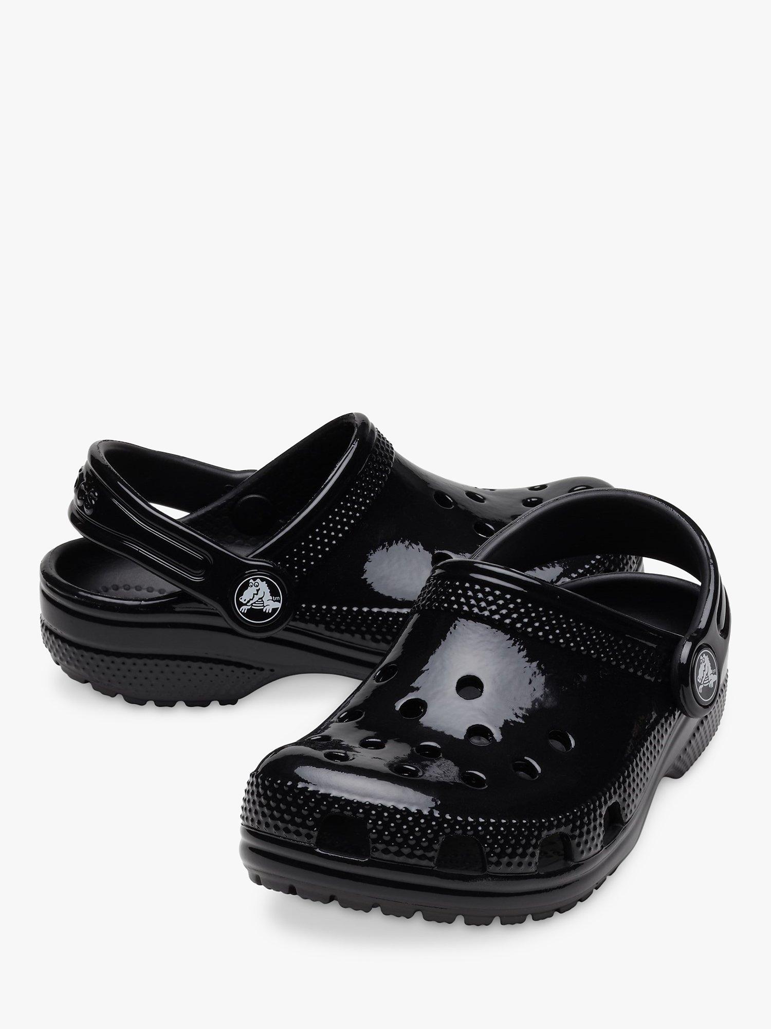 Product image 4 of 6, which shows Crocs Kids' Classic Glossy Clogs, Black, C4