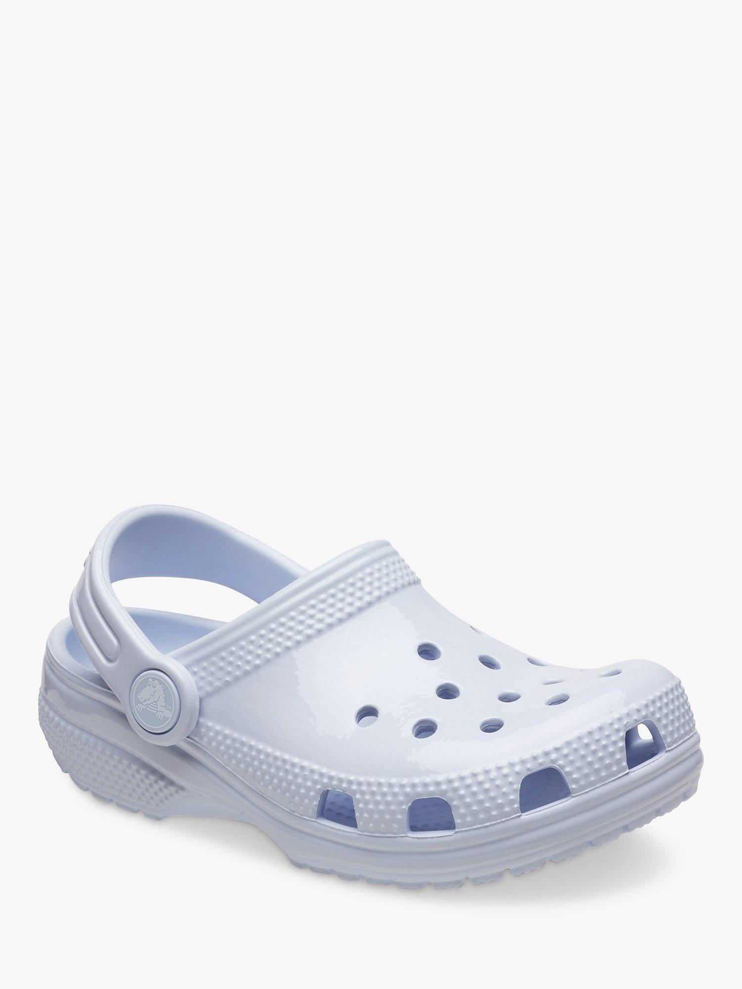 Product image 2 of 6, which shows Crocs Kids' Classic Glossy Clogs, Pale Blue, 4 Jnr