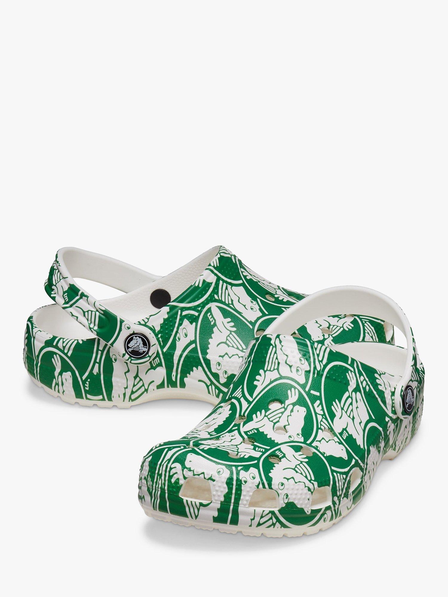 Product image 4 of 6, which shows Crocs Kids' Classic Graphic Clogs, Green/White, 7 Jnr