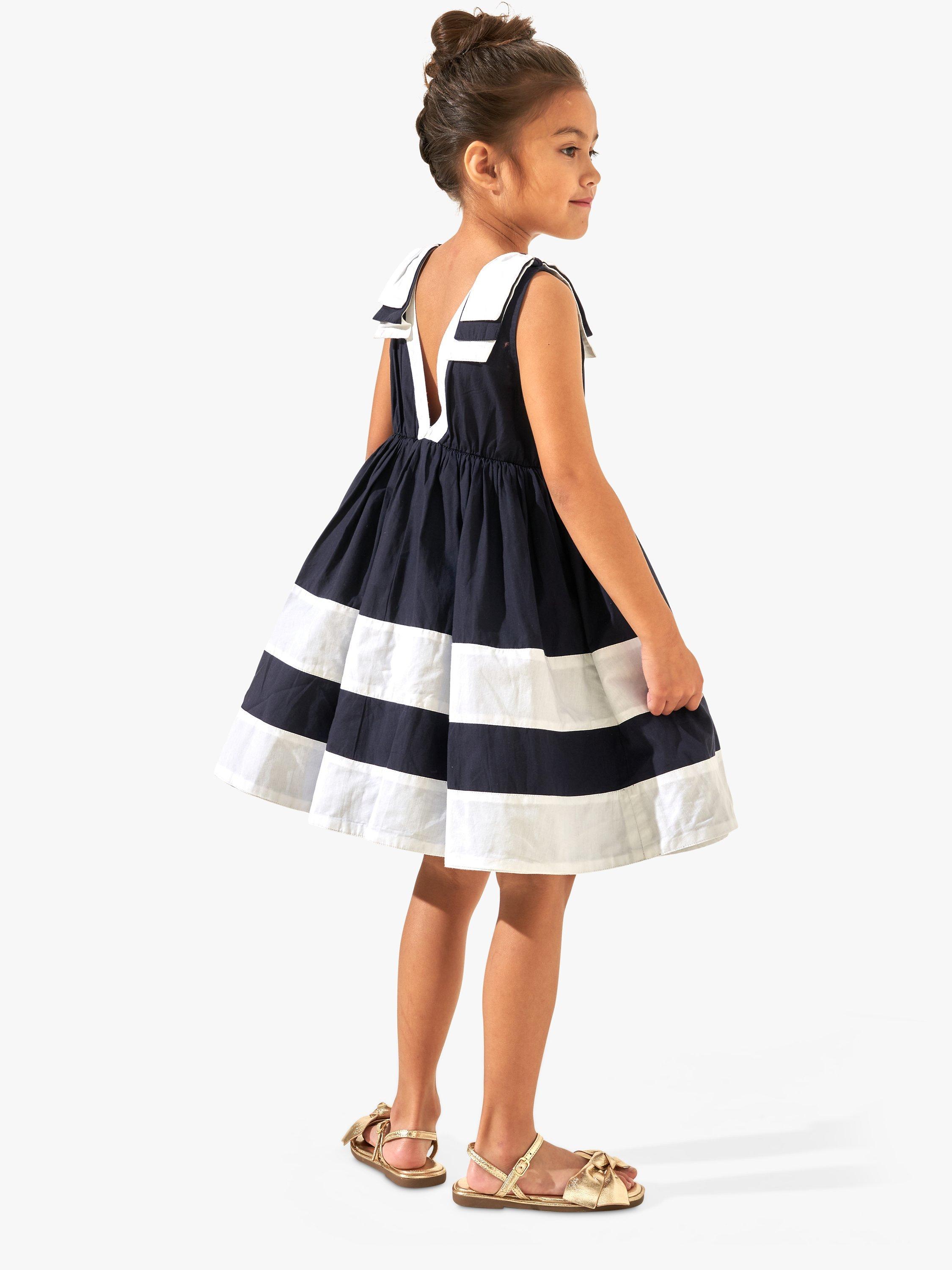 Product image 2 of 6, which shows Angel & Rocket Kids' Avery Bow Shoulder Border Dress, Navy/White, 10 years