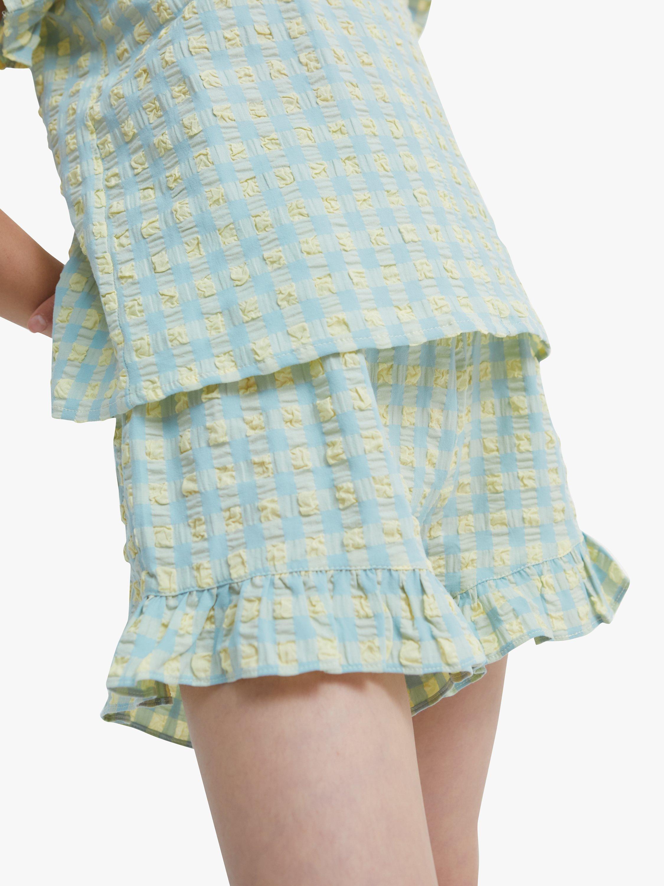 Product image 1 of 5, which shows The New Society Kids' Check Ruffle Detail Shorts, Yellow/Green, 10 years