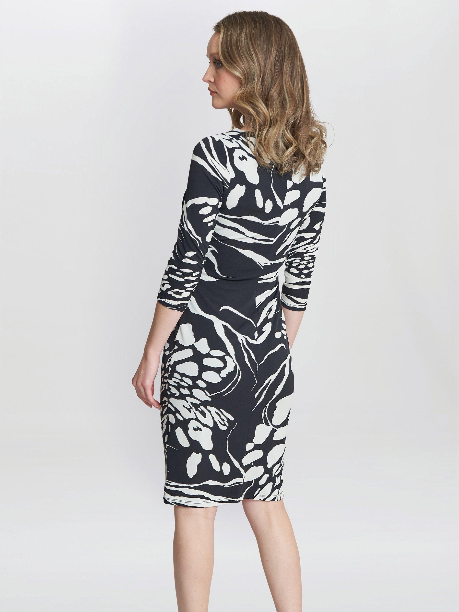 Product image 2 of 5, which shows Gina Bacconi Bianca Abstract Print Jersey Ruffle Dress, Black/Cream, 20