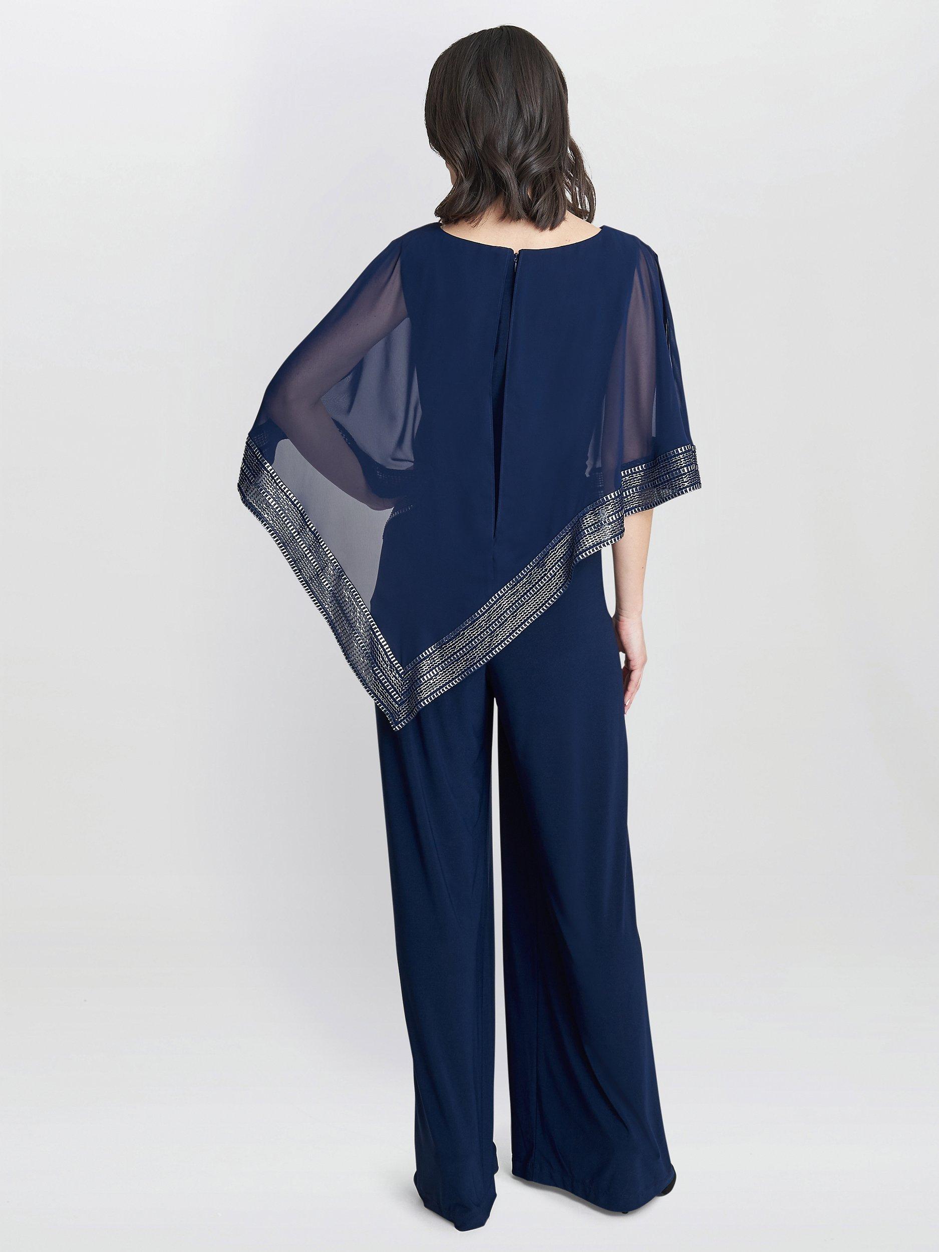 Product image 2 of 5, which shows Gina Bacconi Eve Asymmetrical Foil Trim Cape Jumpsuit, Navy/Silver, 8