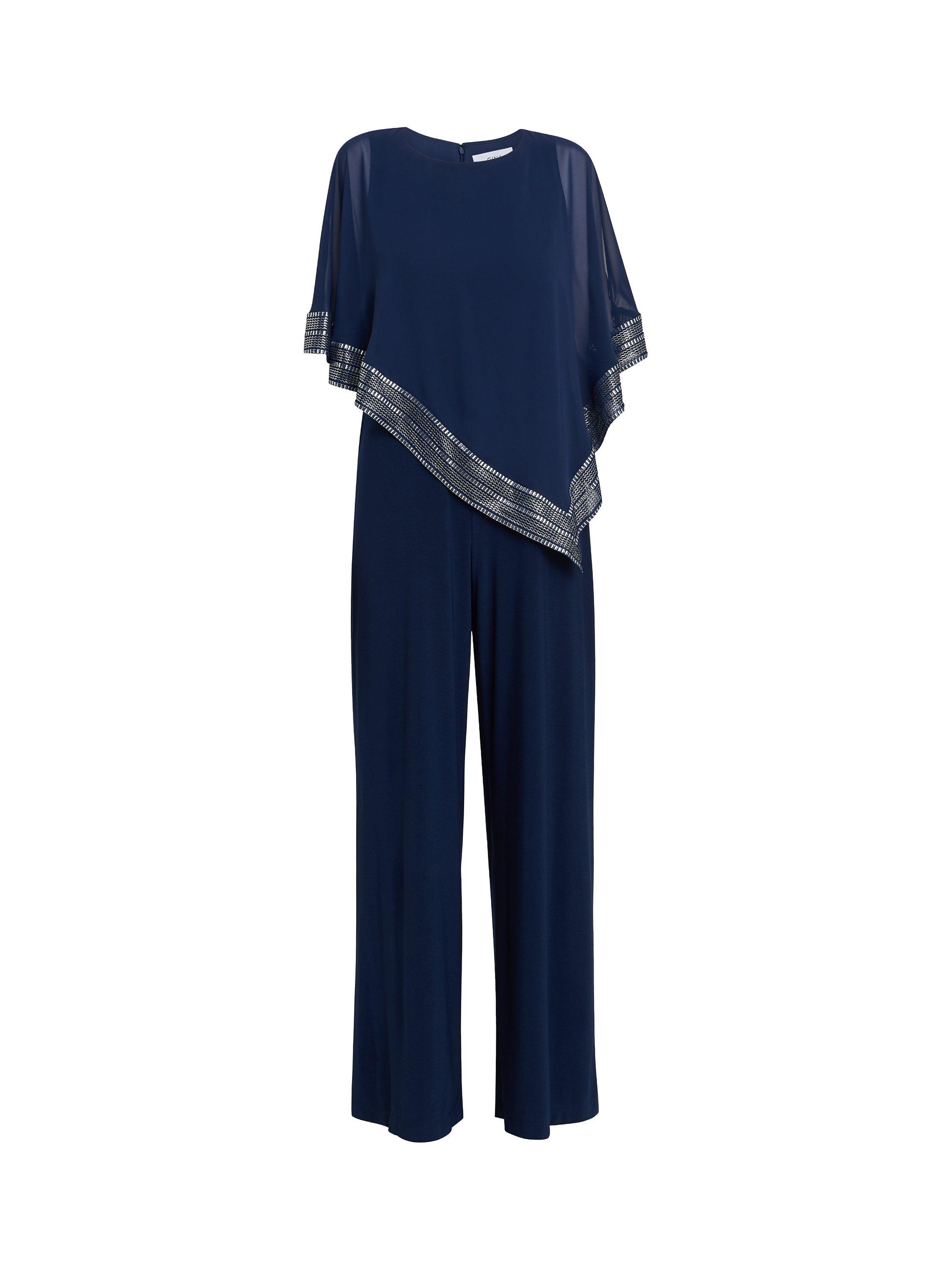 Product image 4 of 5, which shows Gina Bacconi Eve Asymmetrical Foil Trim Cape Jumpsuit, Navy/Silver, 8