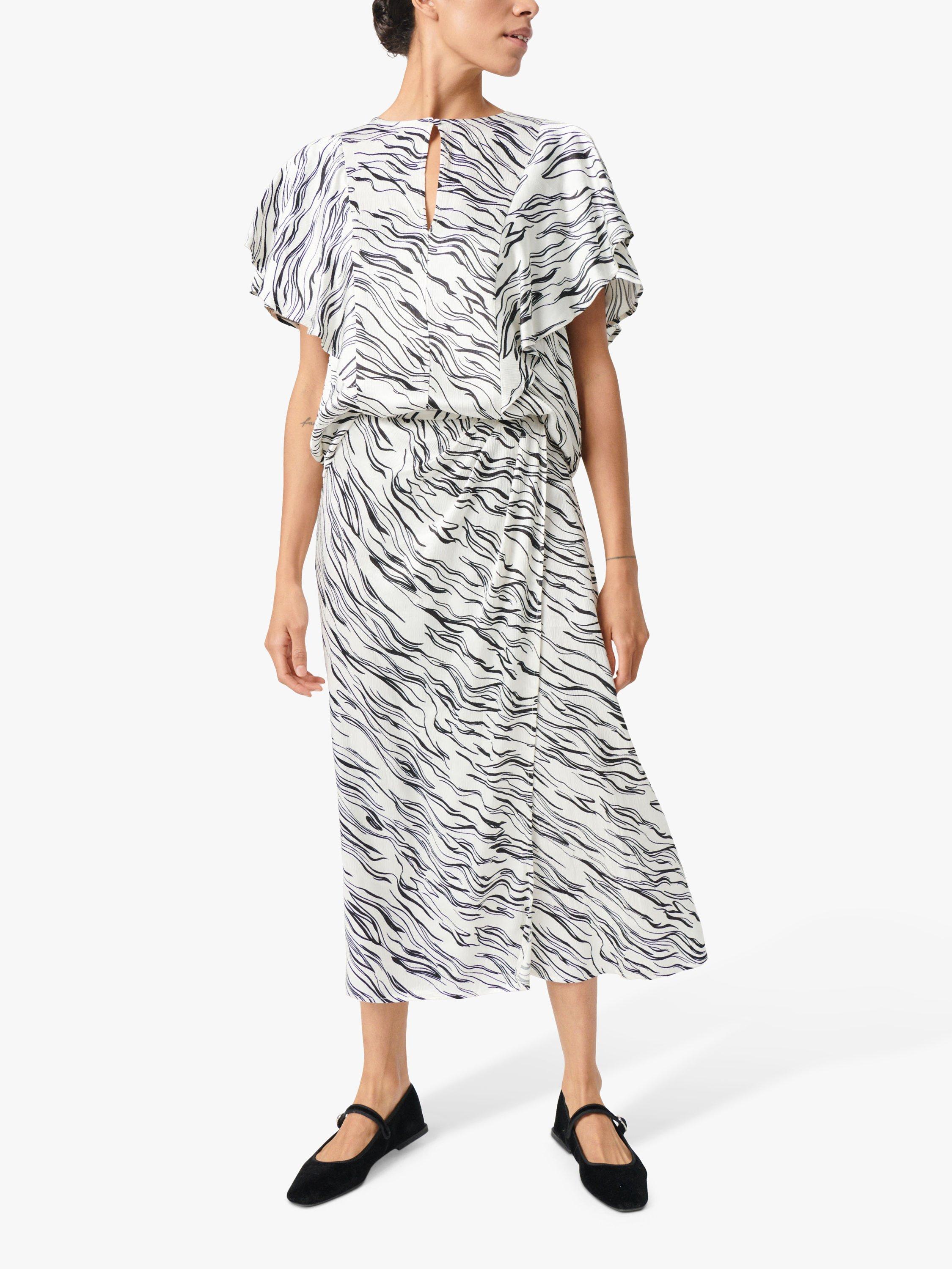 Product image 3 of 7, which shows Soaked In Luxury Vinka Ruffle Sleeve Round Neck Blouse, White/Black Wave, M