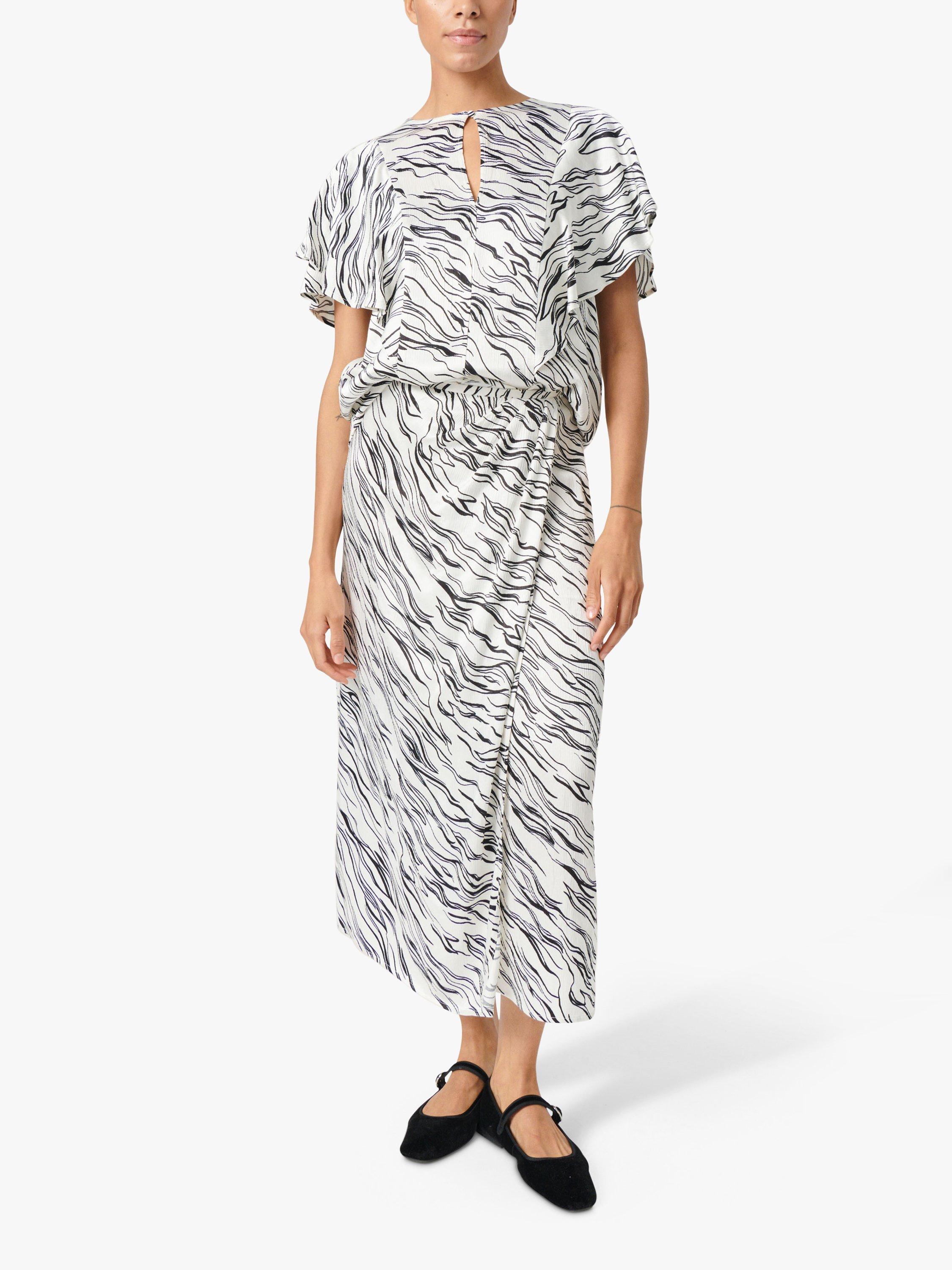 Product image 4 of 7, which shows Soaked In Luxury Vinka Ruffle Sleeve Round Neck Blouse, White/Black Wave, M