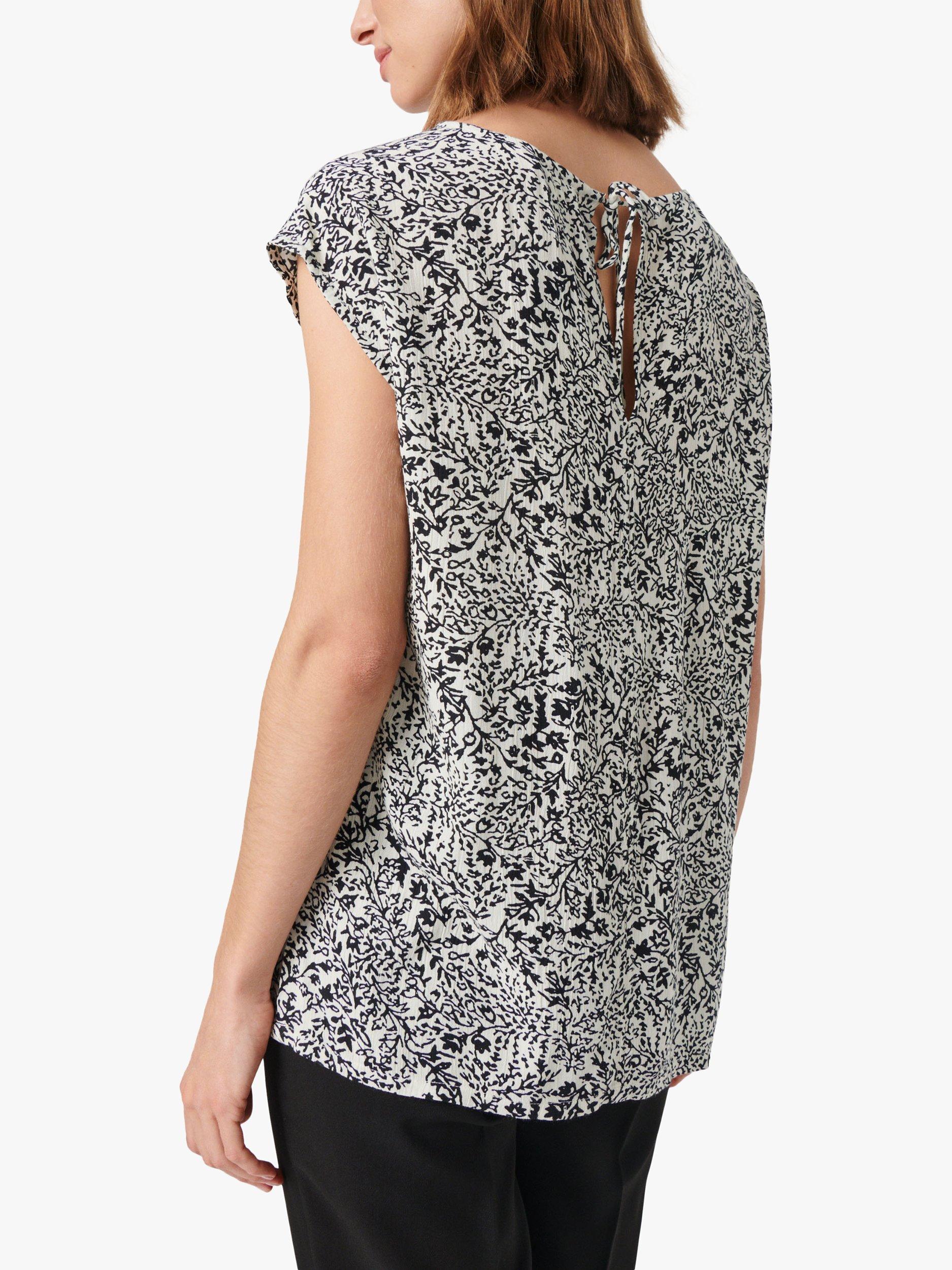 Product image 2 of 6, which shows Soaked In Luxury Zaya Boat Neck Relaxed Fit Top, Black/ White Ditsy, S