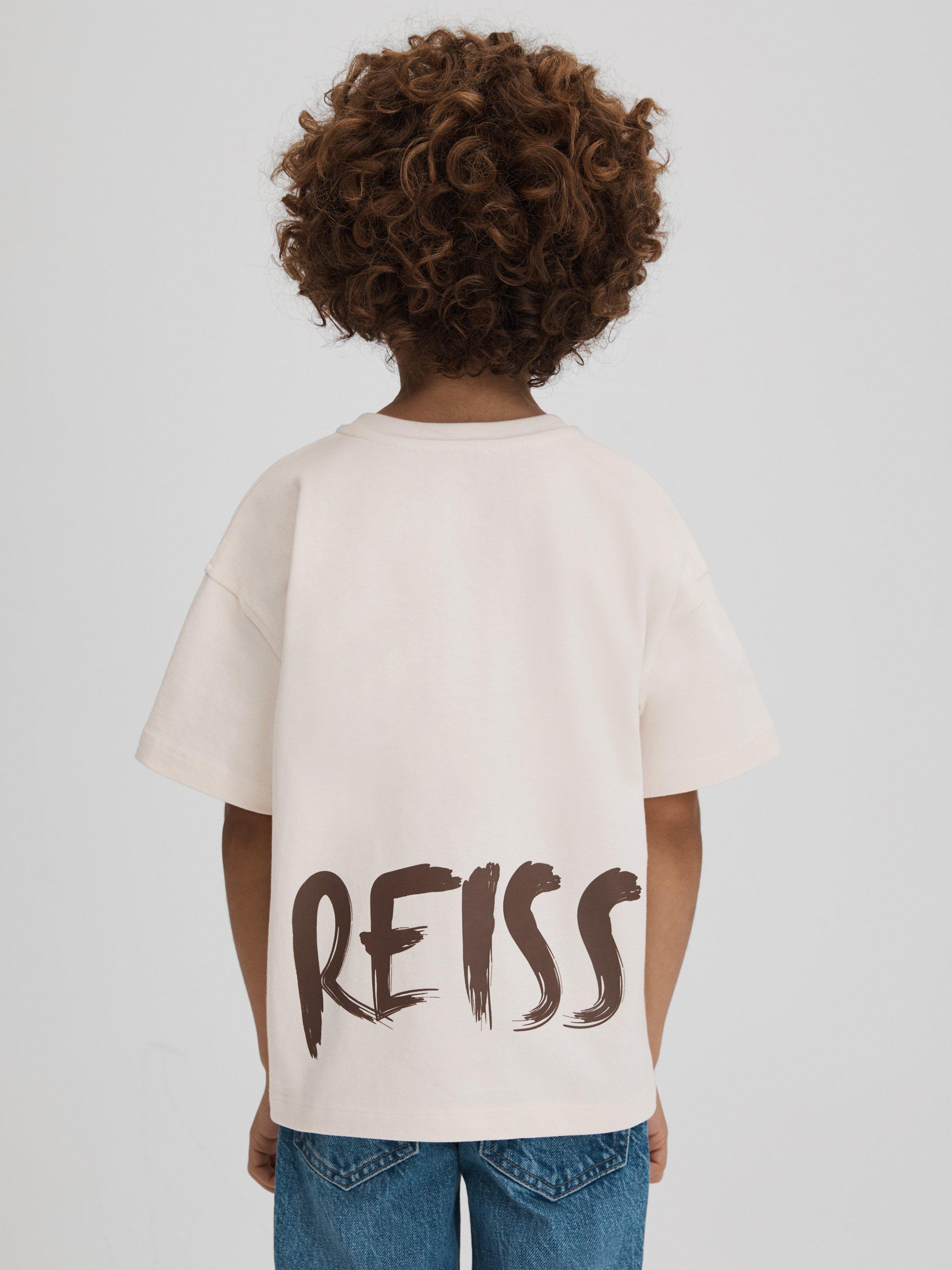 Product image 2 of 5, which shows Reiss Kids' Abbott Paintstroke Logo T-Shirt, Ecru, 13-14 years