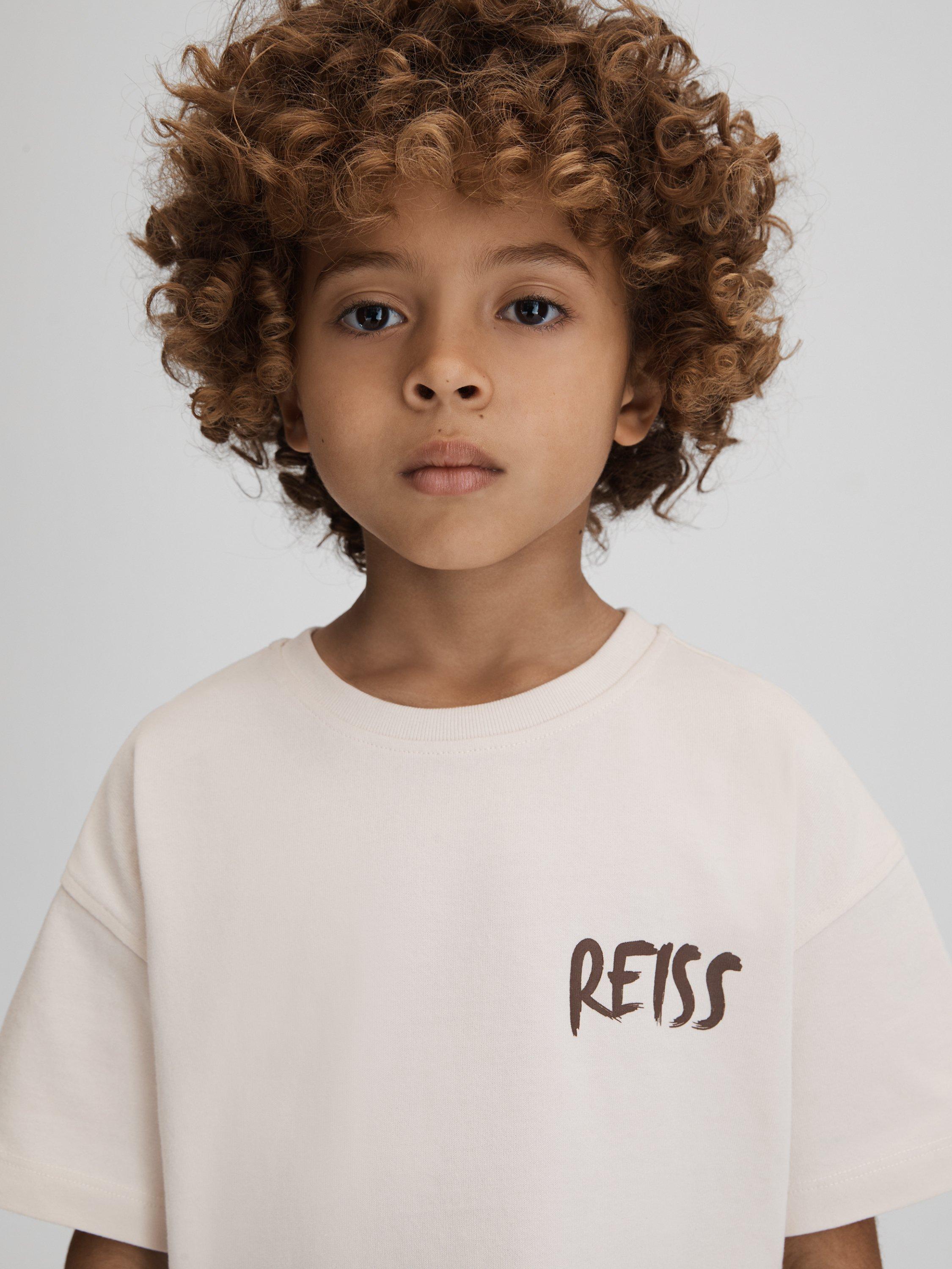Product image 3 of 5, which shows Reiss Kids' Abbott Paintstroke Logo T-Shirt, Ecru, 13-14 years