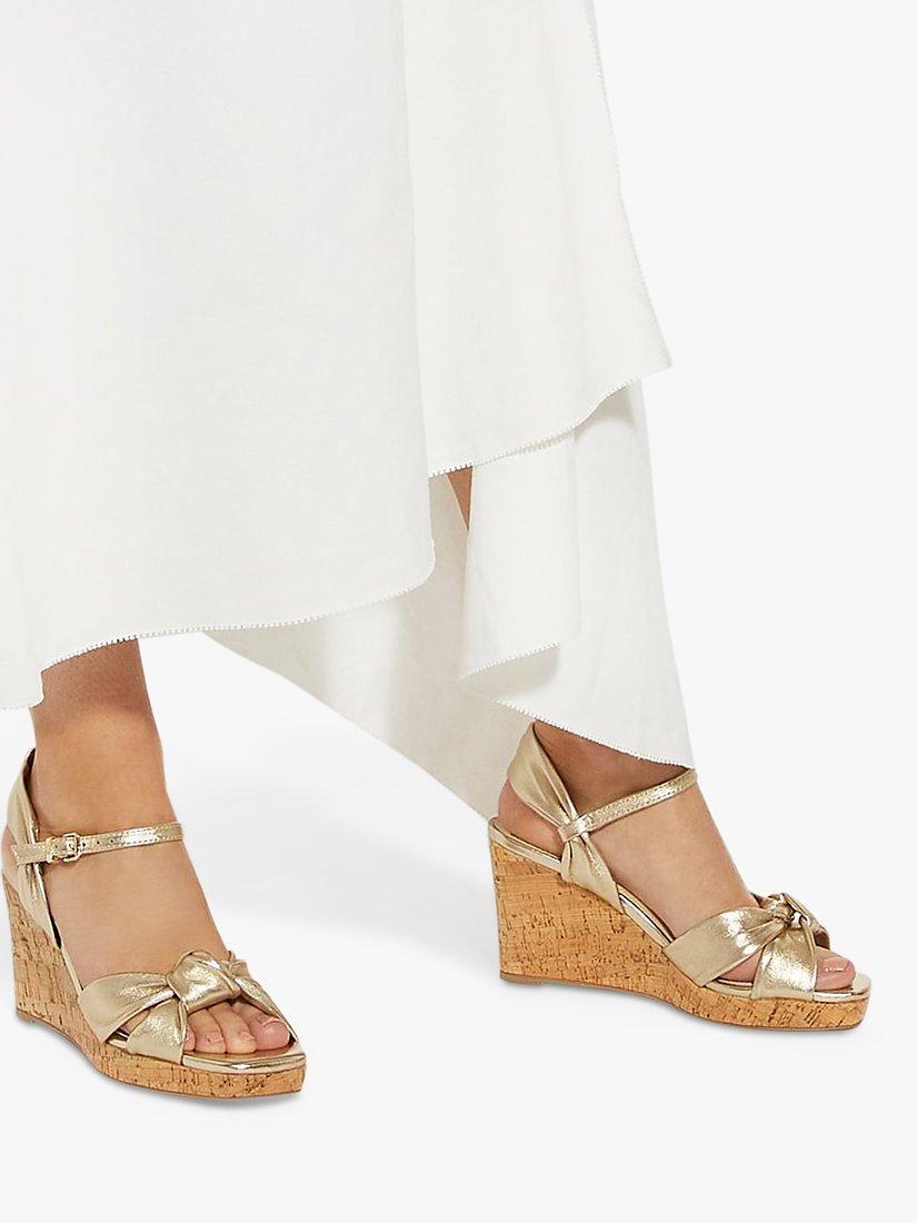 Product image 6 of 6, which shows Dune Kaino Knotted Leather Wedge Sandals, Gold, 3