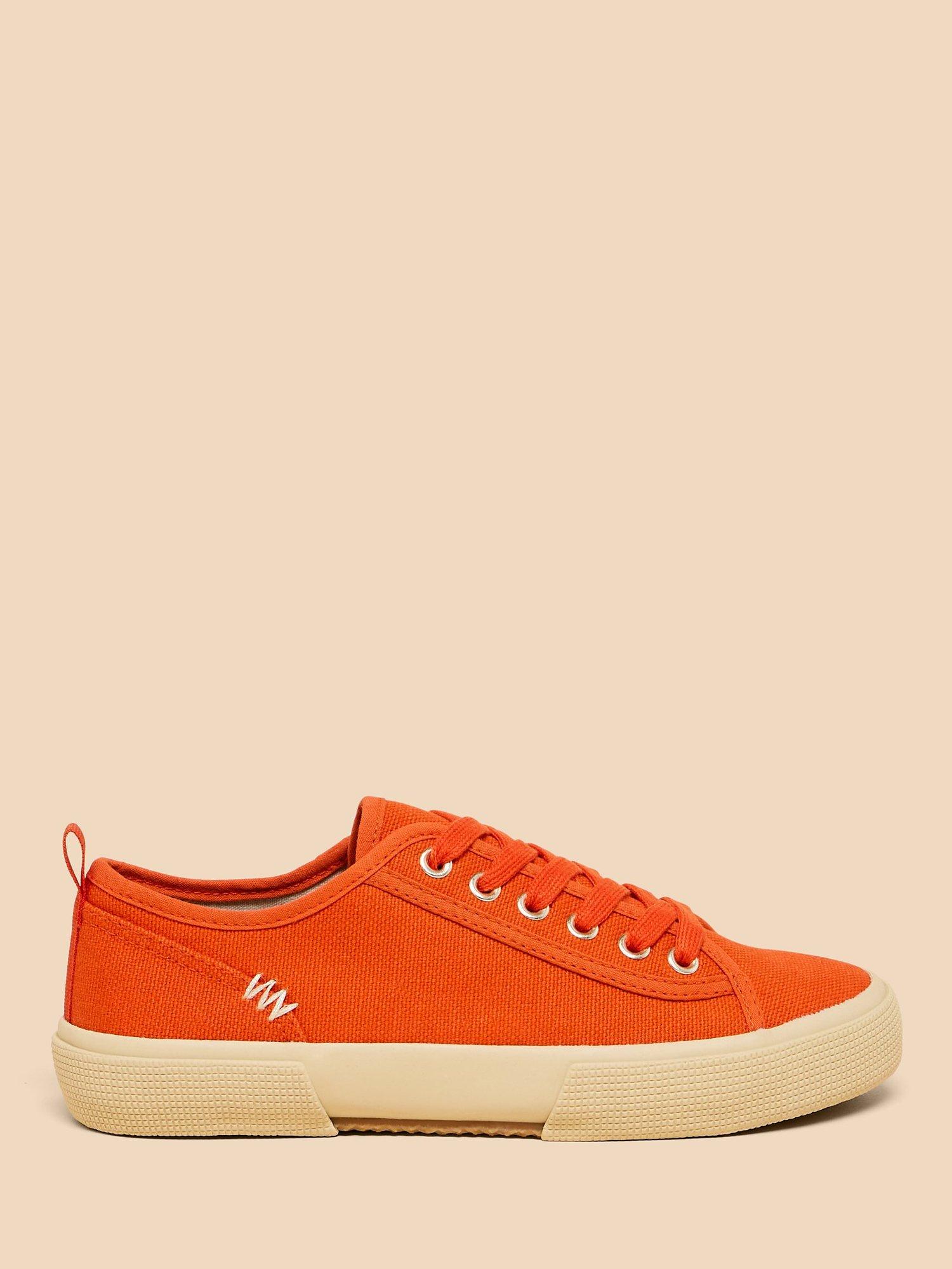 Product image 1 of 4, which shows White Stuff Pippa Canvas Lace Up Trainers, Bright Orange, 3