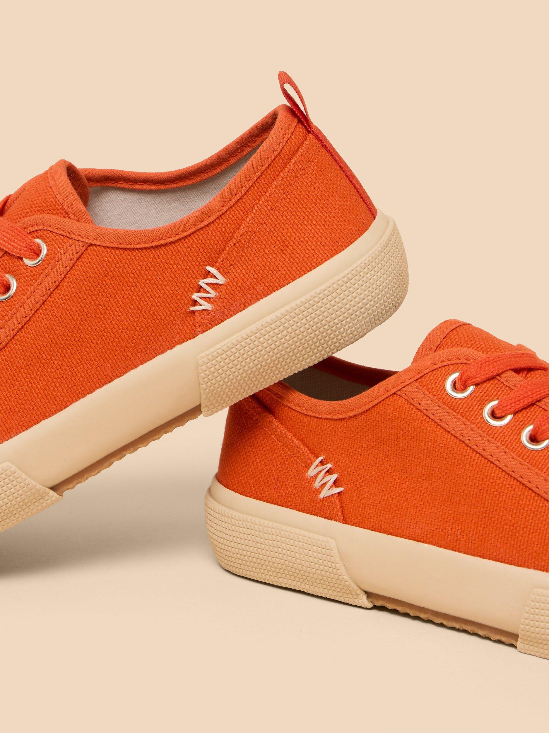 Product image 2 of 4, which shows White Stuff Pippa Canvas Lace Up Trainers, Bright Orange, 3