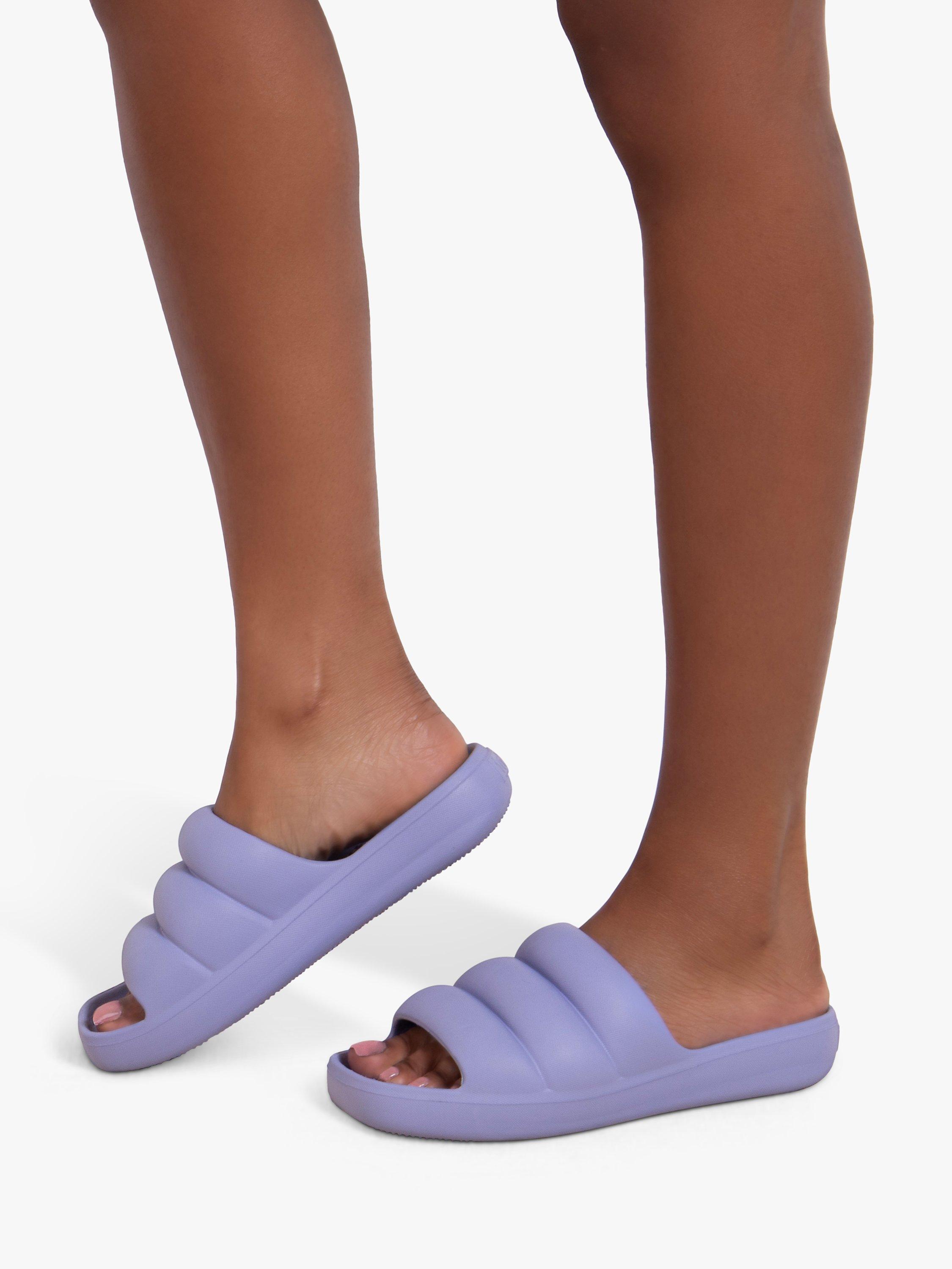 Product image 6 of 6, which shows totes Puffy Slider Sandals, Lilac Periwinkle, 4