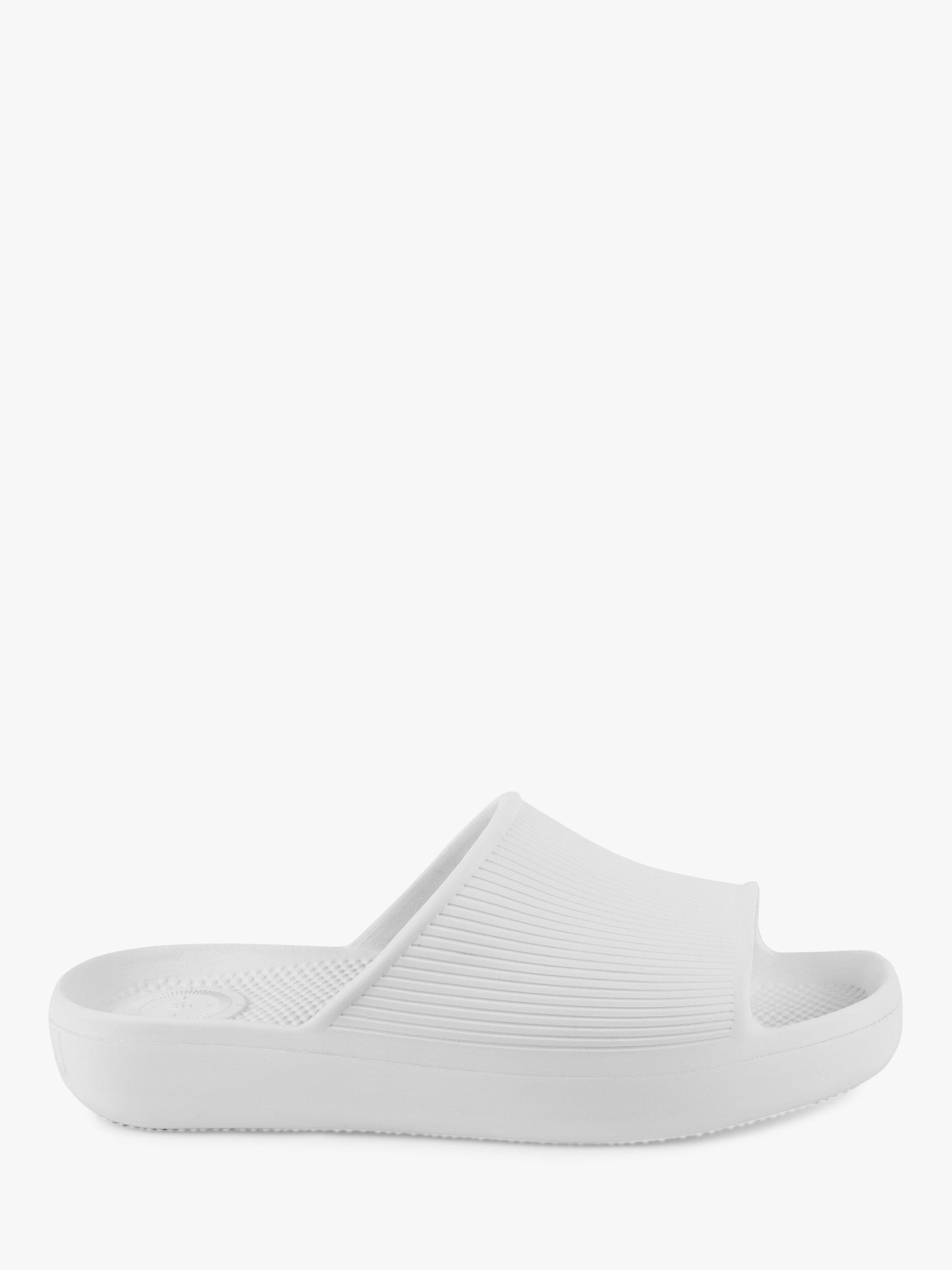 Product image 1 of 6, which shows totes SOLBOUNCE Ribbed Slider Sandals, White, 4