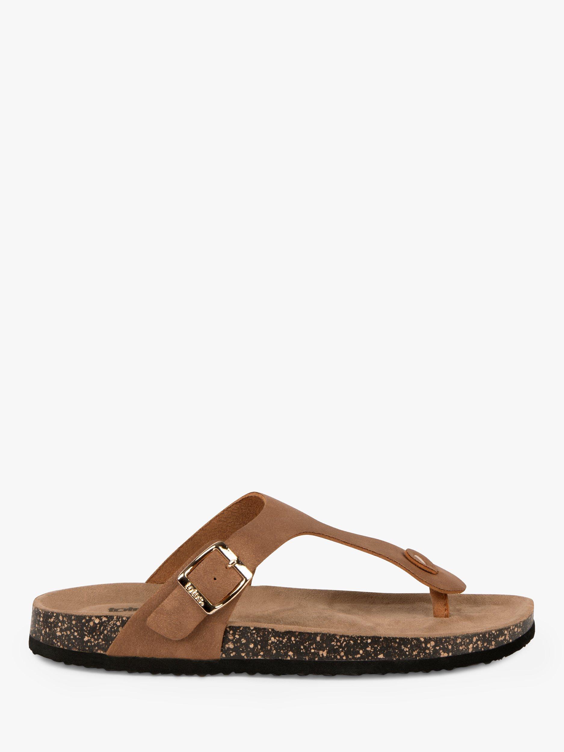 Product image 1 of 6, which shows totes Buckle Toe Post Sandals, Tan, 4