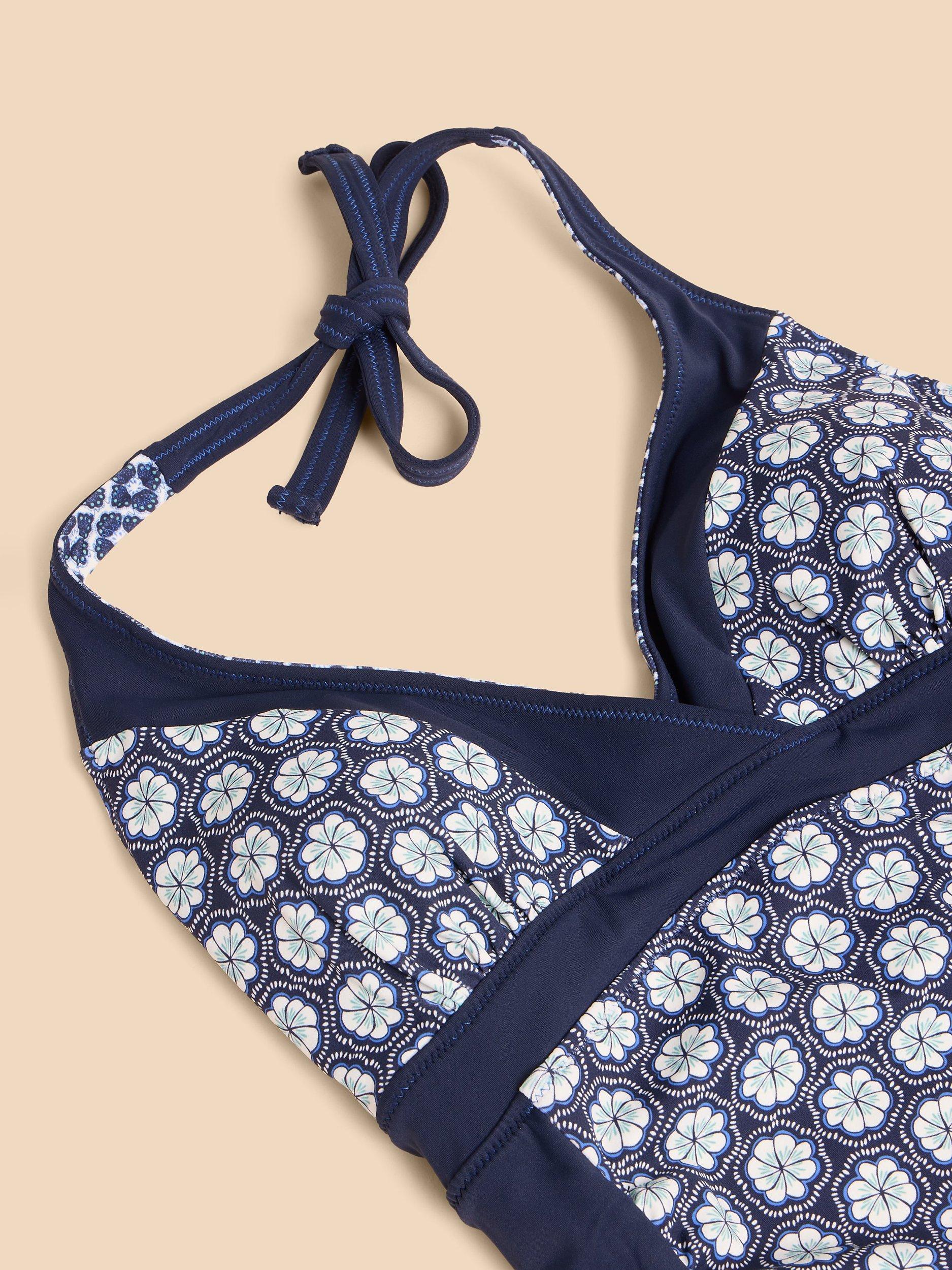 Product image 6 of 7, which shows White Stuff Sunshine Floral Tile Print Halterneck Swimsuit, Navy/Multi, 6