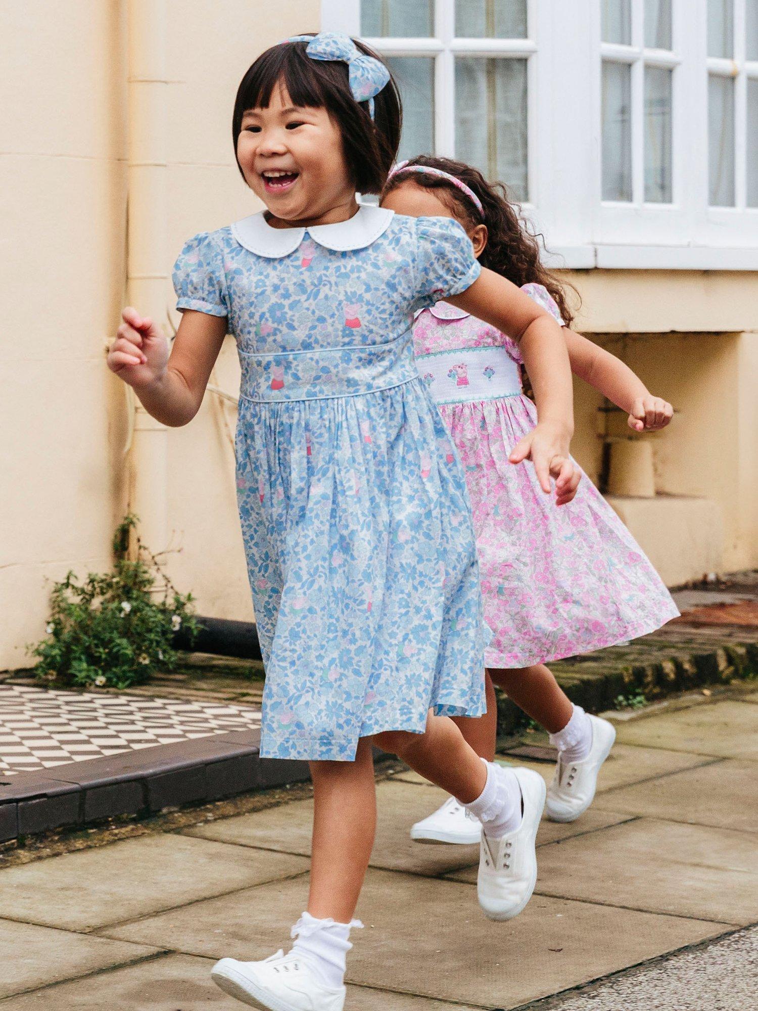 Product image 4 of 10, which shows Trotters Kids' Peppa Pig Meadow Dress, Blue Meadow, 12 months