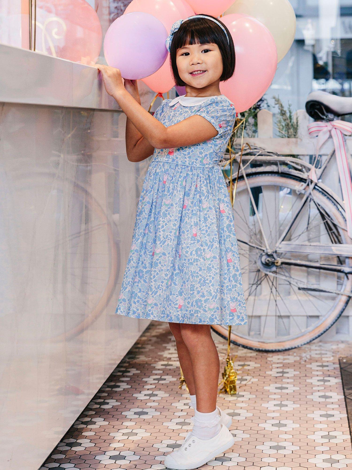 Product image 7 of 10, which shows Trotters Kids' Peppa Pig Meadow Dress, Blue Meadow, 12 months