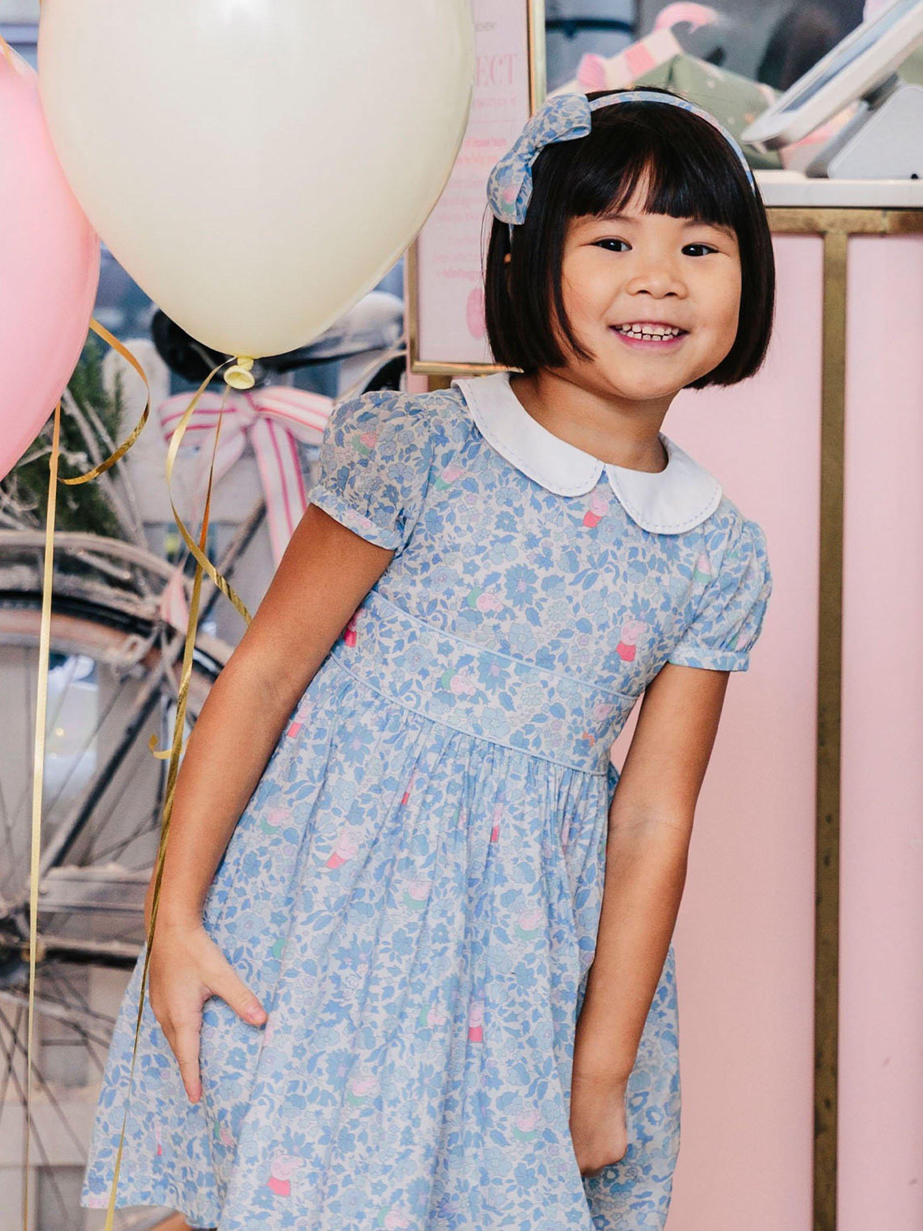 Product image 9 of 10, which shows Trotters Kids' Peppa Pig Meadow Dress, Blue Meadow, 12 months