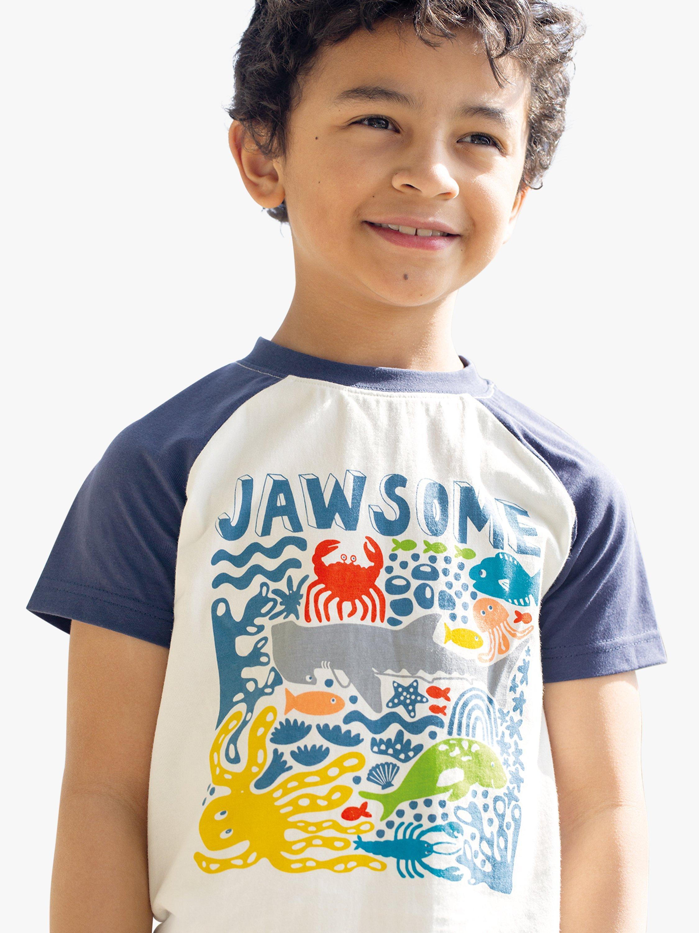 Product image 1 of 4, which shows Frugi Kids' Reid Jawsome Organic Cotton Raglan T-shirt, Soft White/Multi, 7-8 years