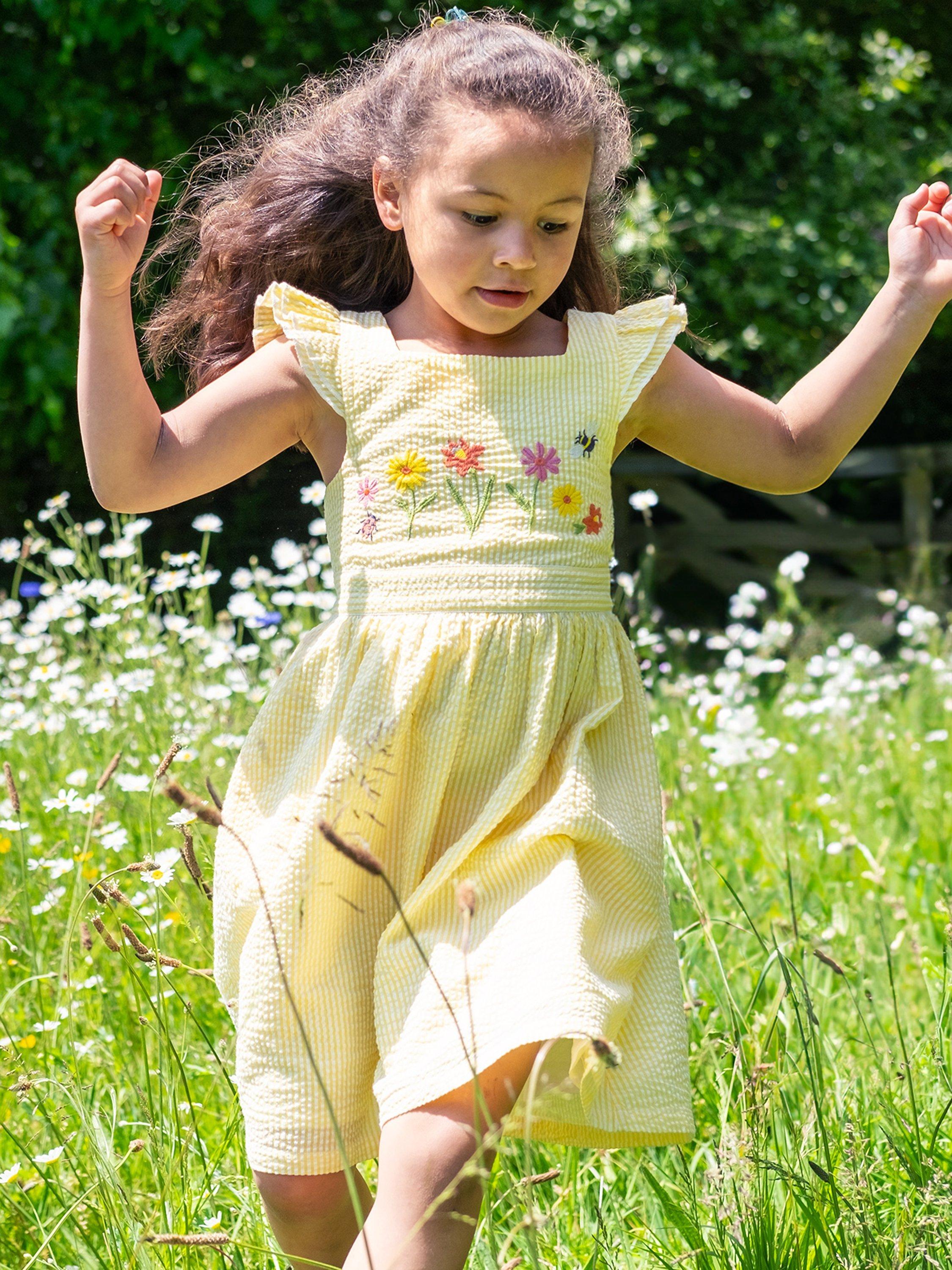 Product image 1 of 5, which shows Frugi Kids' Jasmine Organic Cotton Seersucker Floral Embroidered Dress, Dandelion, 2-3 years