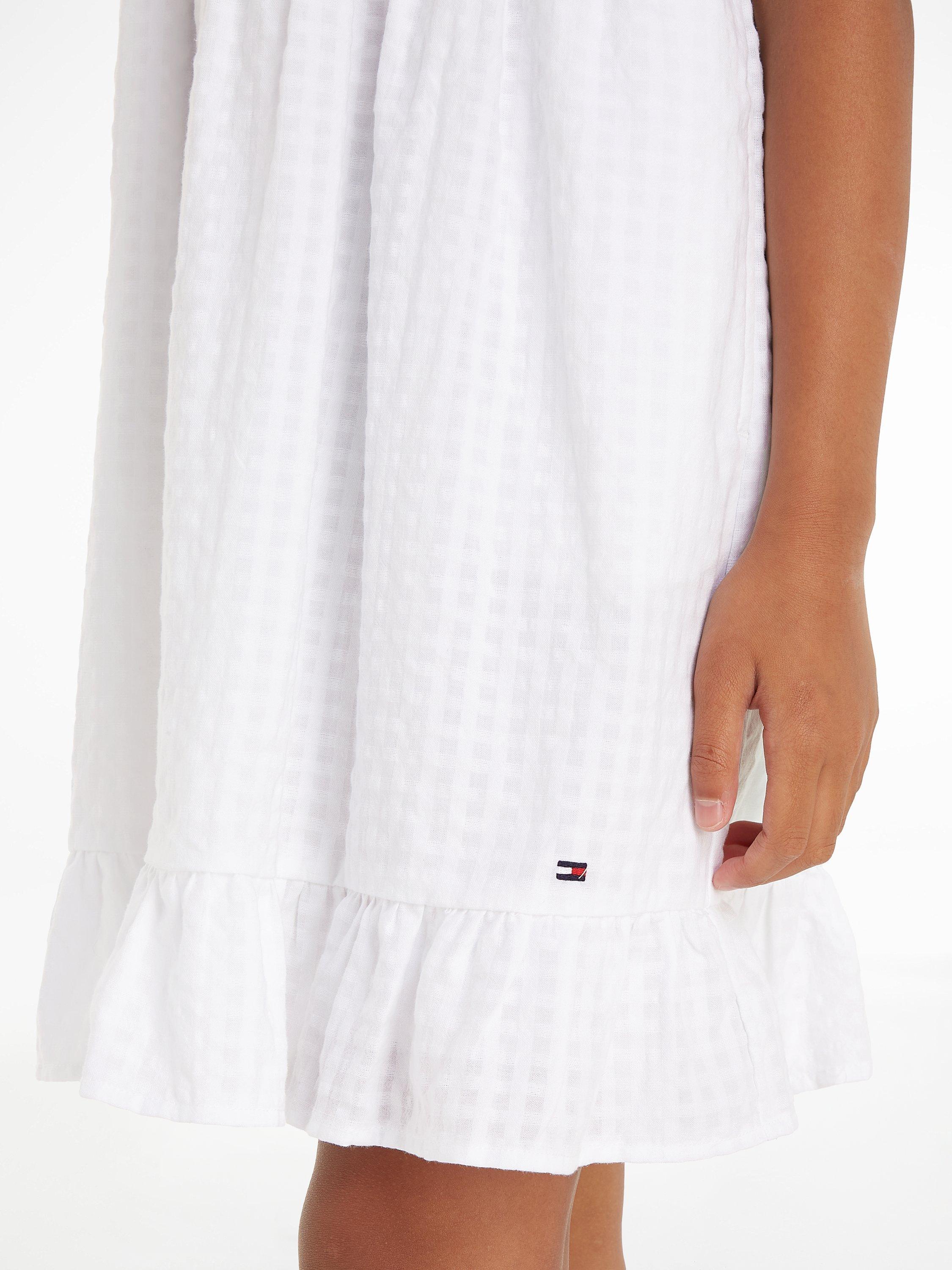 Product image 3 of 5, which shows Tommy Hilfiger Kids' Seersucker Gingham Texture Frill Detail Dress, White, 4 years