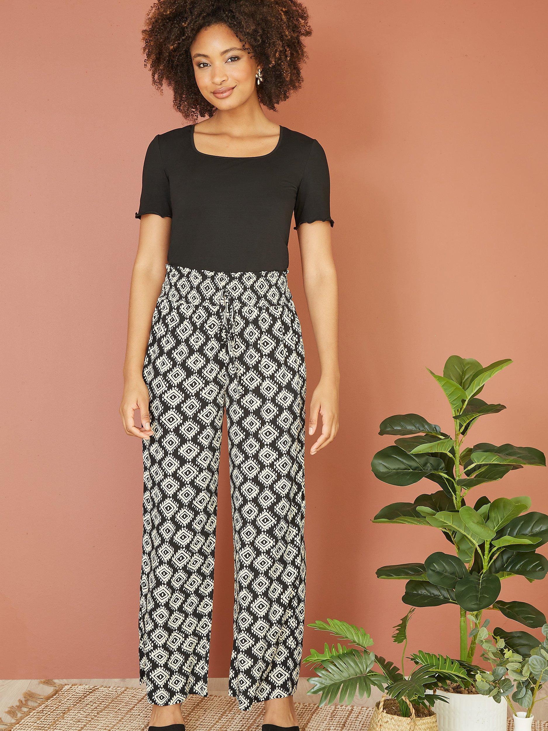 Product image 2 of 4, which shows Yumi Geometric Print Relaxed Fit Trousers, Black, 8