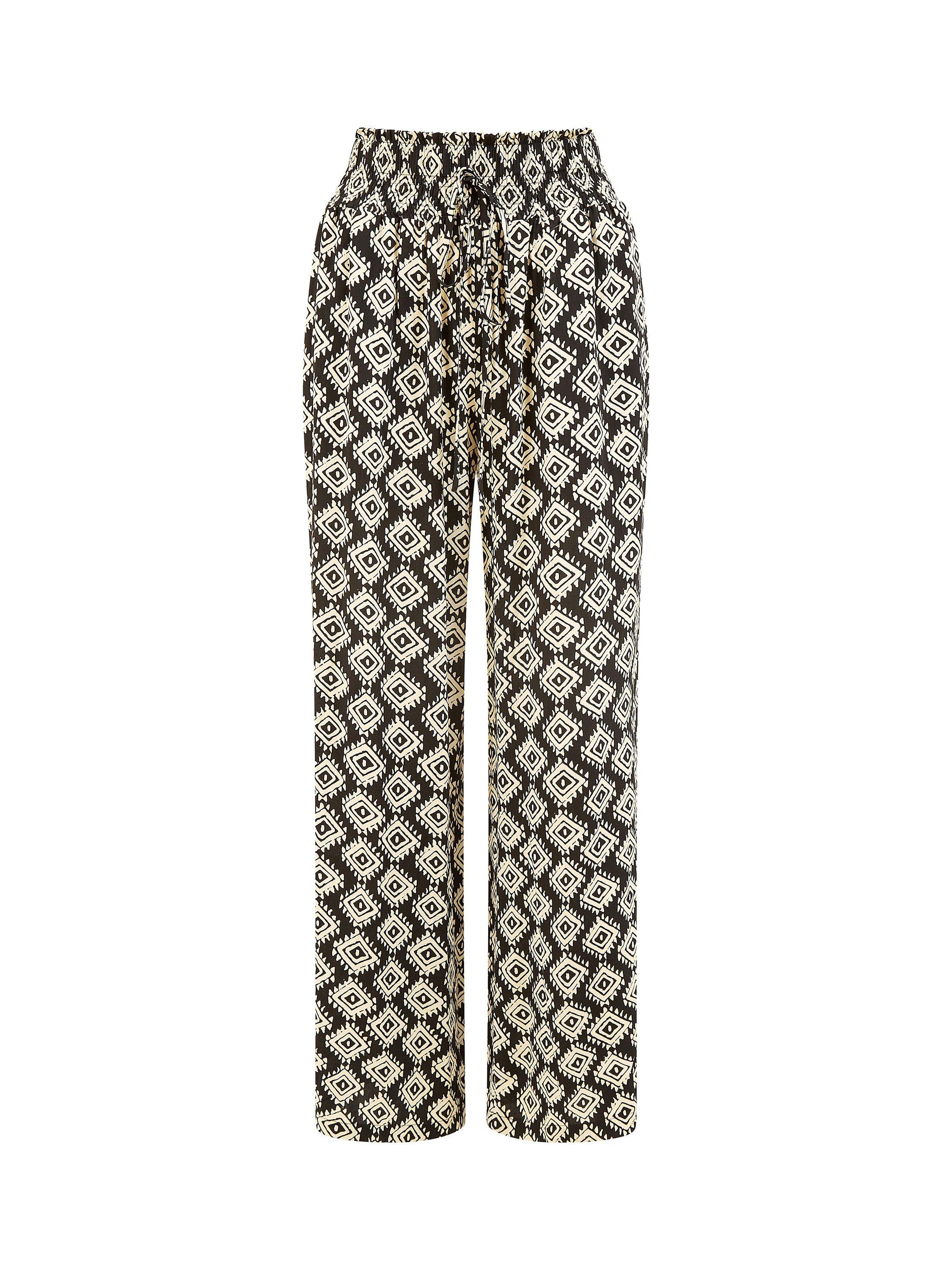 Product image 4 of 4, which shows Yumi Geometric Print Relaxed Fit Trousers, Black, 8