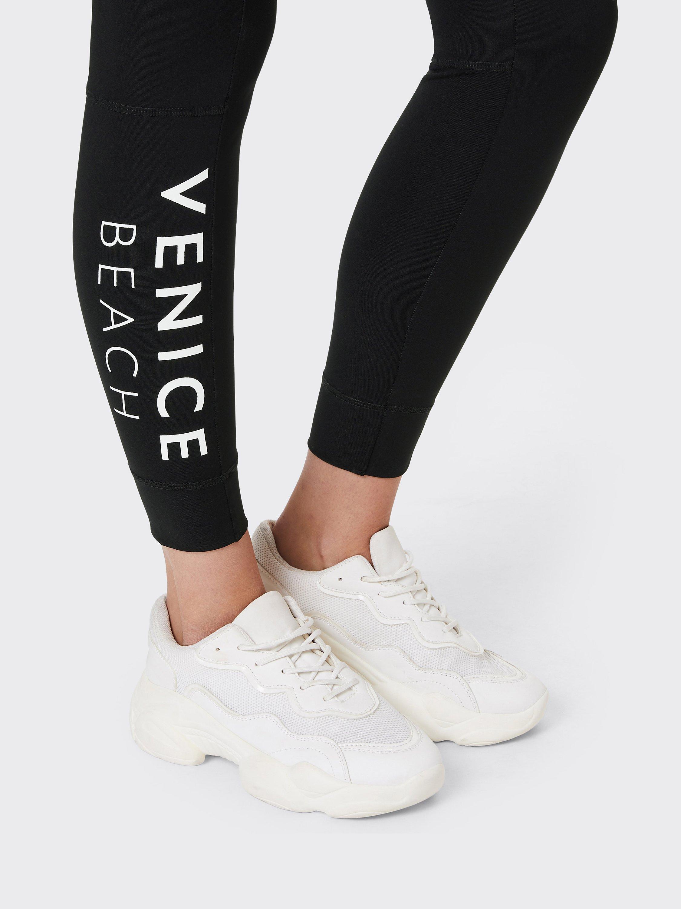 Product image 6 of 7, which shows Venice Beach Romina 1/1 Leggings, Black/Sunshine, XS