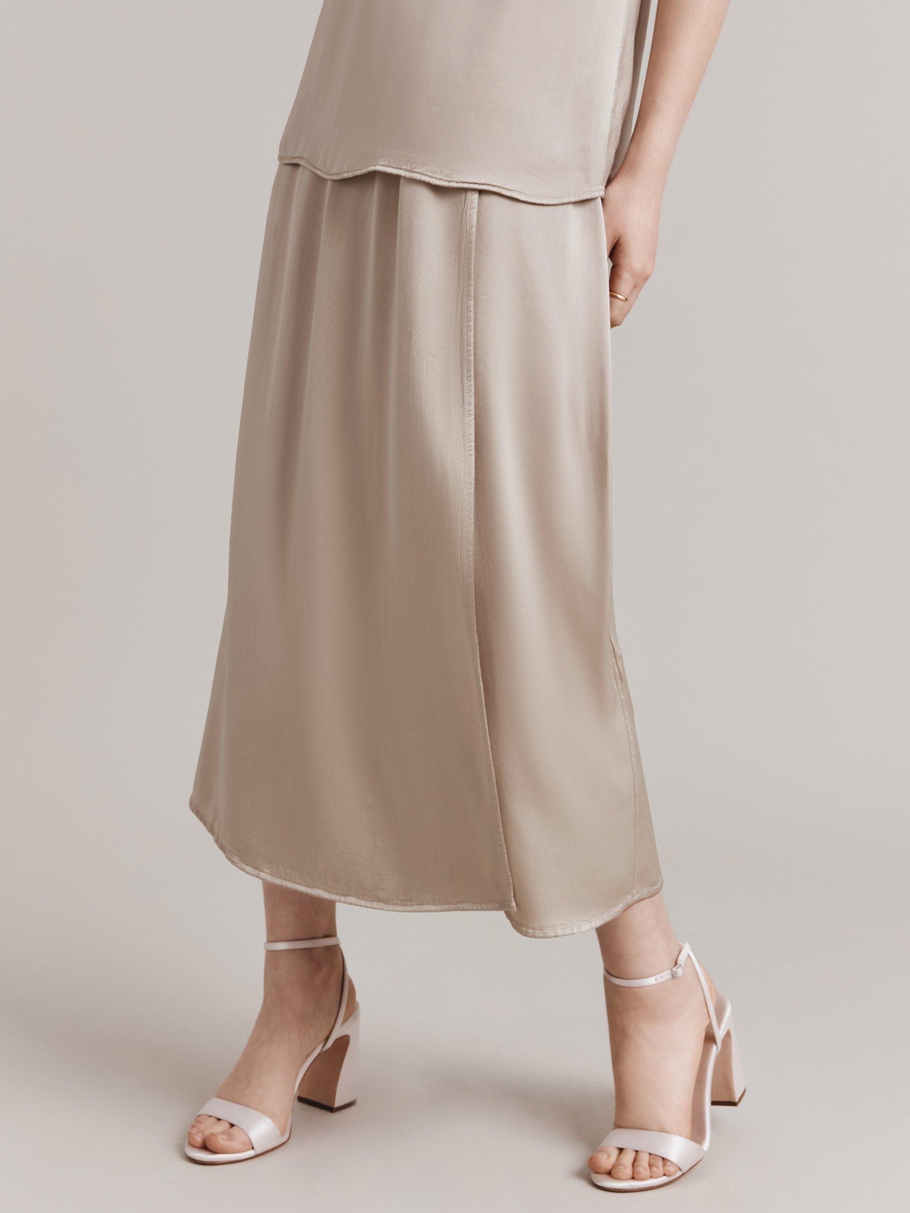 Product image 1 of 3, which shows Ghost Aleya Faux Wrap Satin Midi Skirt, Light Putty, L