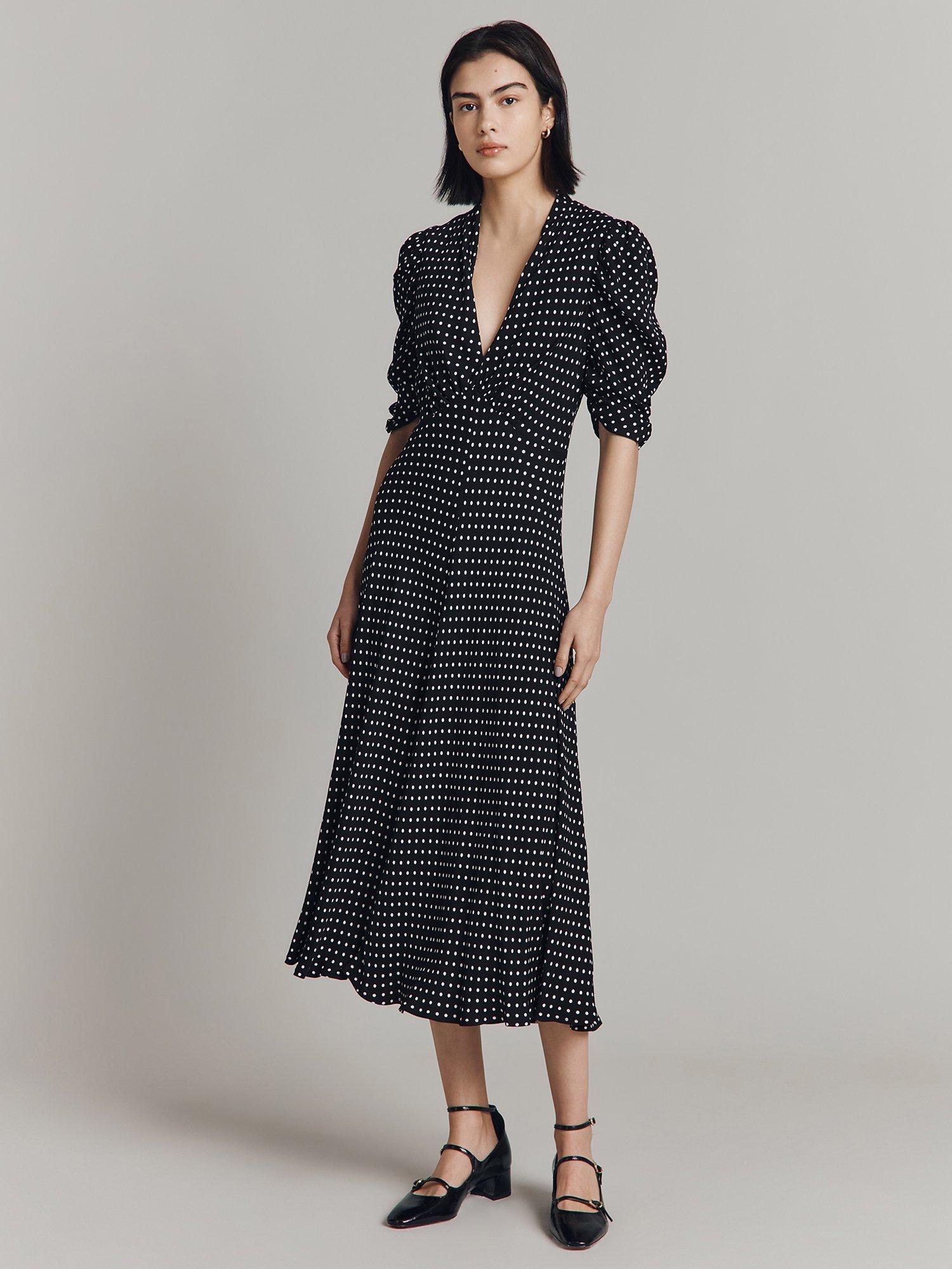 Product image 1 of 4, which shows Ghost Madi Spot Midi Dress, Black, XS