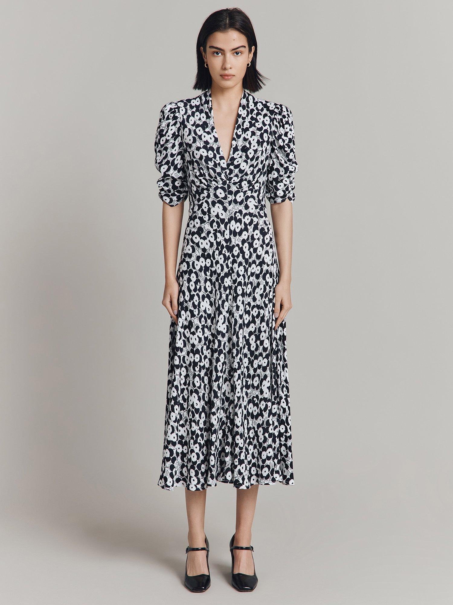 Product image 1 of 4, which shows Ghost Madi Floral Midi Dress, Black Buds, S