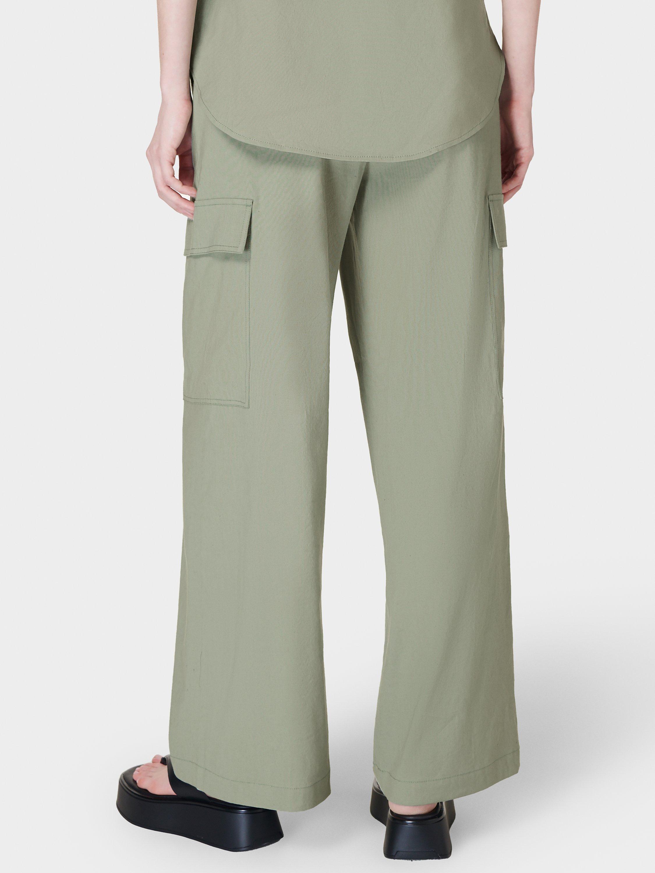 Product image 2 of 8, which shows Sweaty Betty Summer Stretch Linen Blend Trousers, Savannah Green, XS