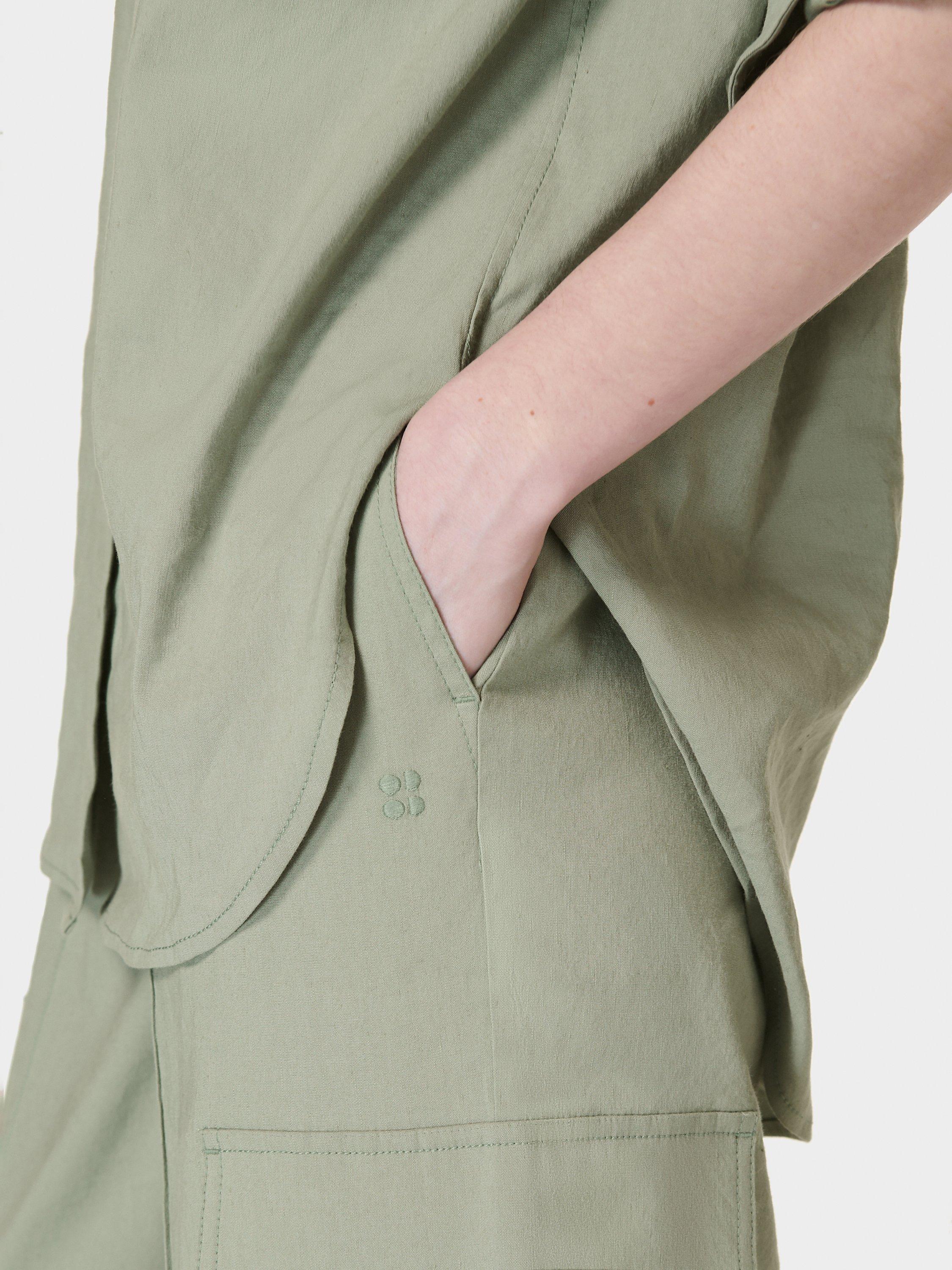 Product image 6 of 8, which shows Sweaty Betty Summer Stretch Linen Blend Trousers, Savannah Green, XS