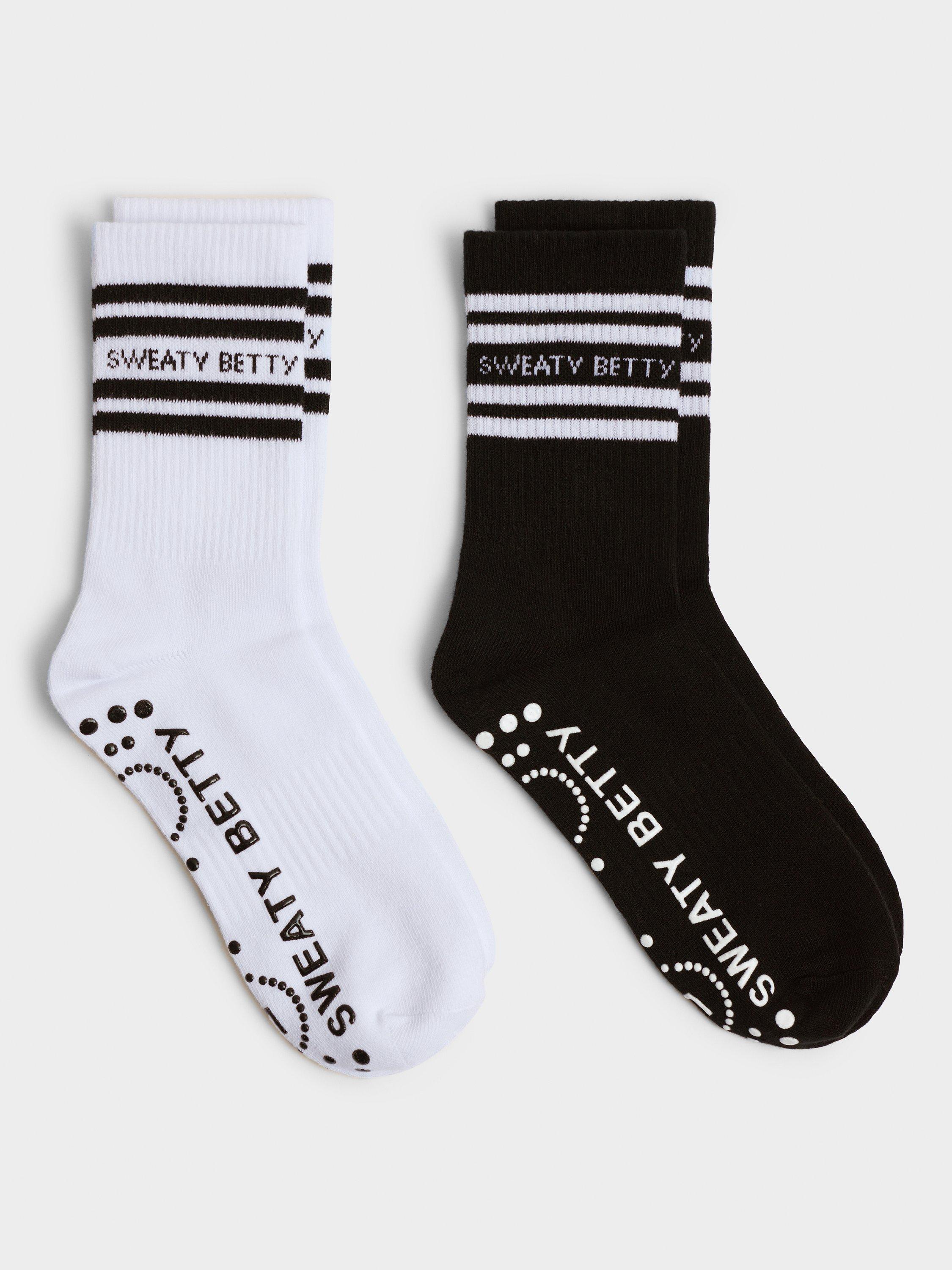 Product image 1 of 4, which shows Sweaty Betty Varsity Gripper Ankle Socks, Pack of 2, White/Black, 2.5-5