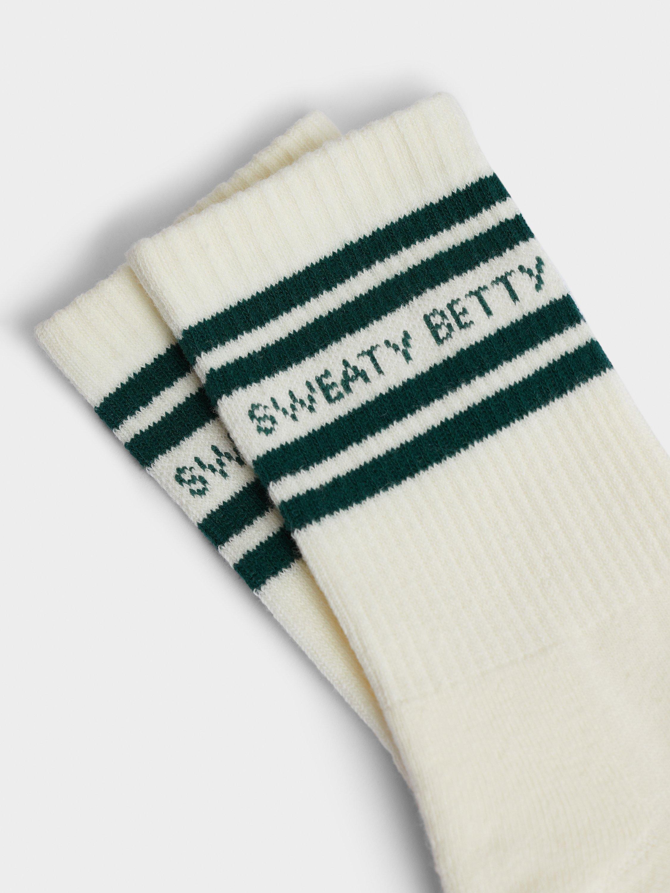 Product image 2 of 2, which shows Sweaty Betty Varsity Slogan Organic Cotton Blend Socks, Cream/Retro Green, 2.5-5