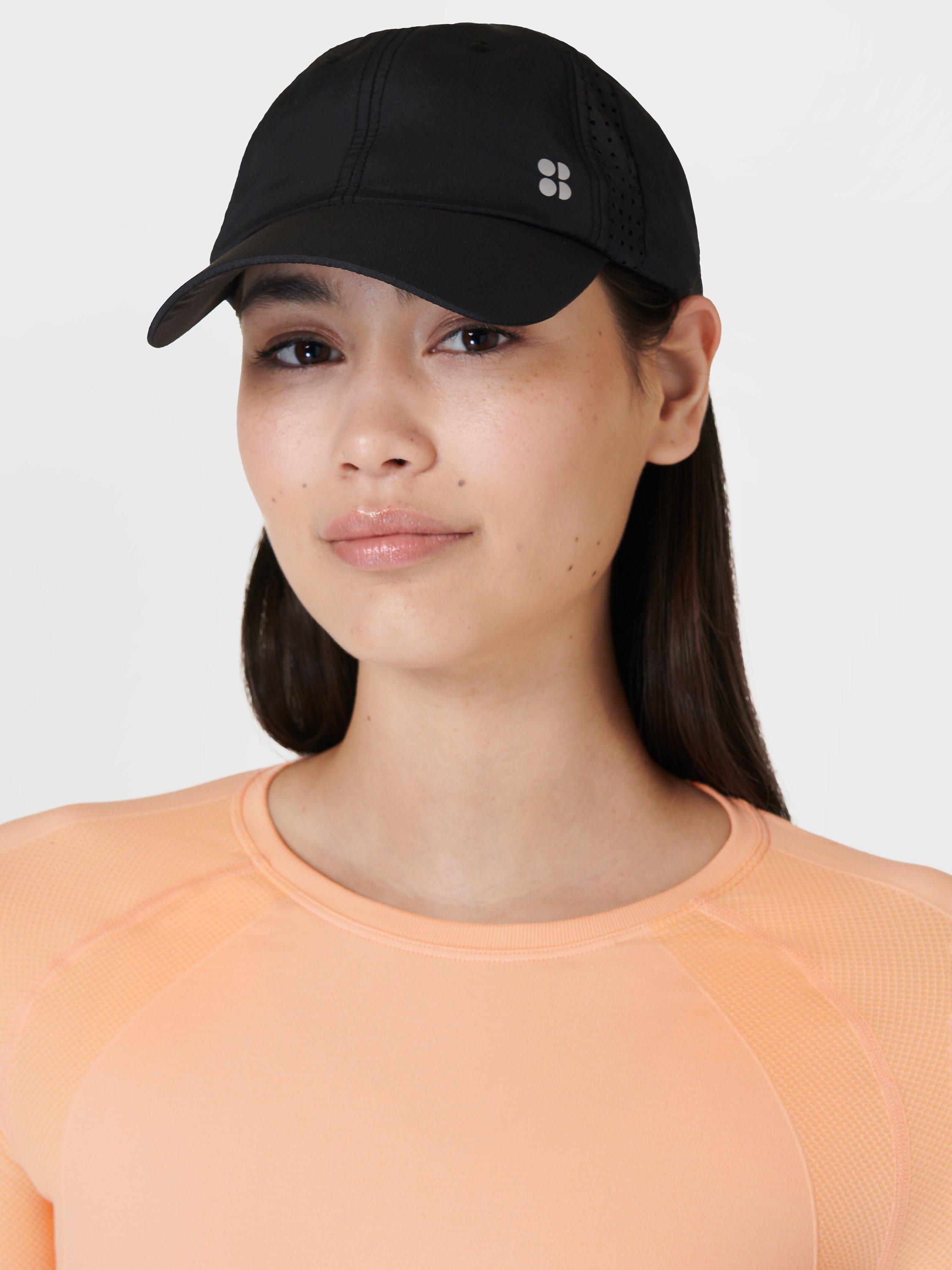 Product image 2 of 4, which shows Sweaty Betty Swiftie Pace Baseball Cap, Black