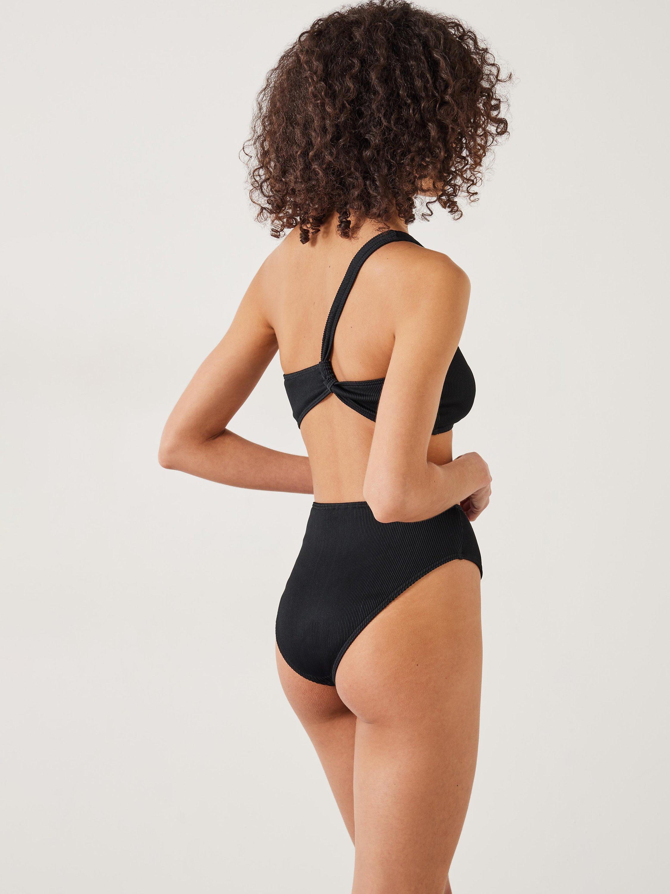 Product image 2 of 5, which shows HUSH Olivia Asymmetric Ribbed Bikini Top, Black, 4